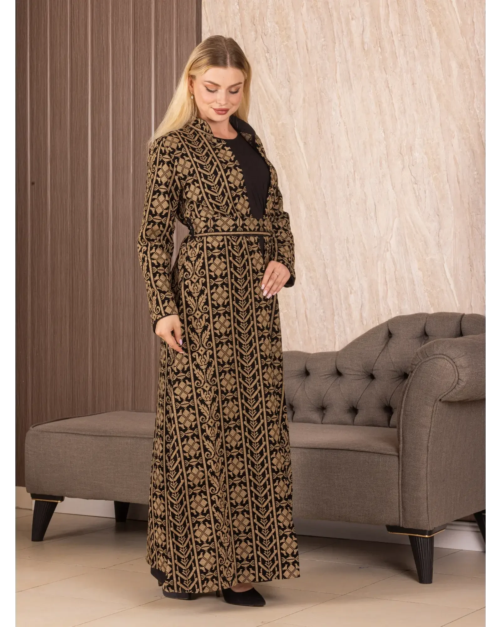 Palestinian Elegance embroidered long cardigan with intricate black and gold traditional patterns