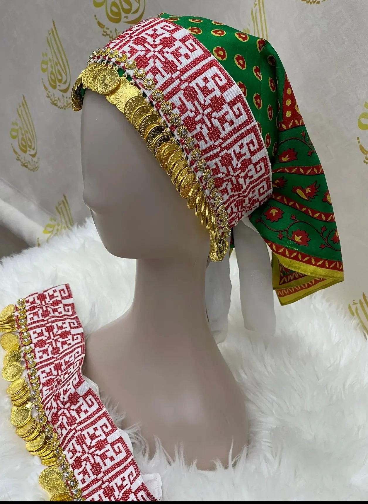 Palestinian Elegance tatreez head scarf with beads and gold coin embellishments displayed on mannequin
