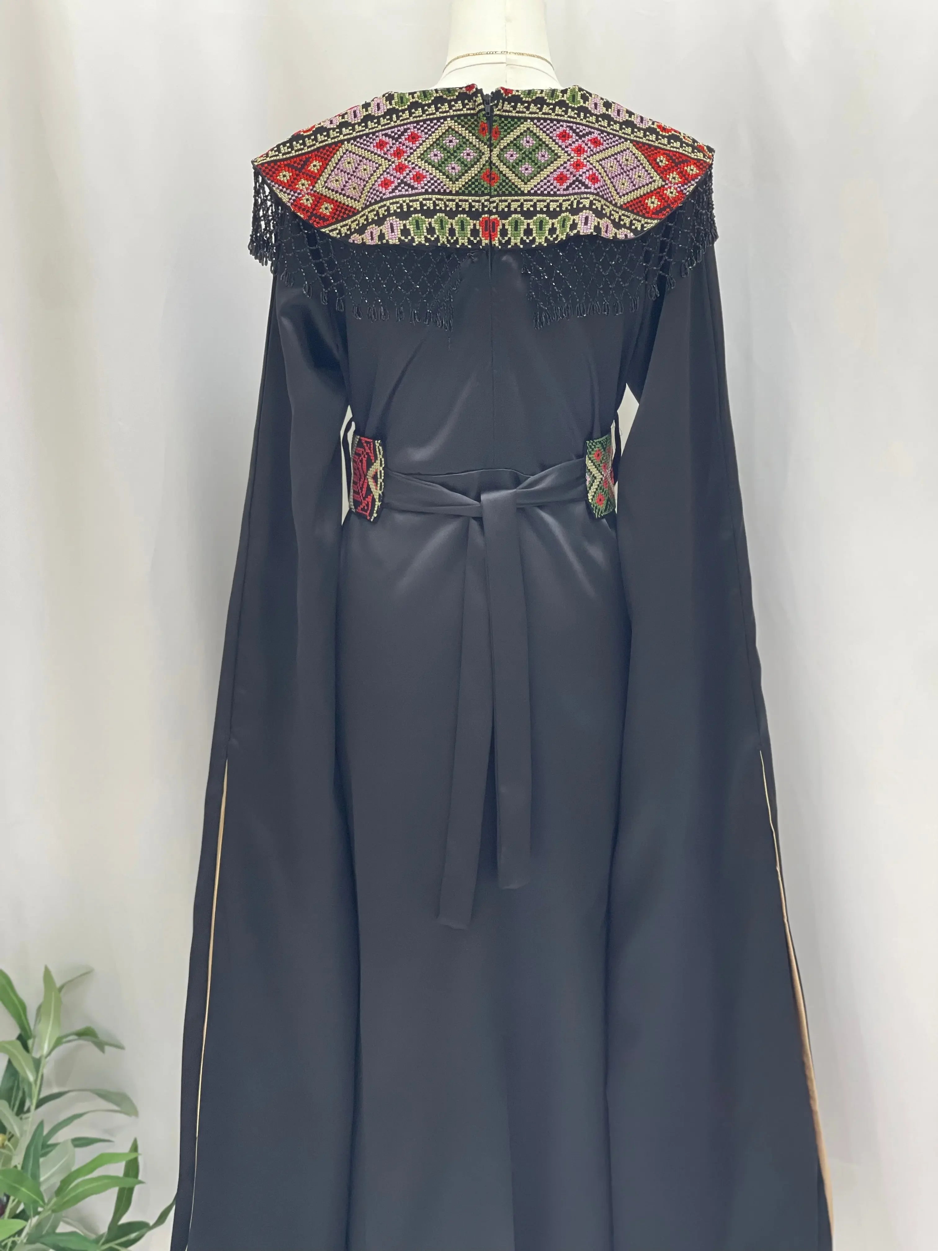 Sophisticated Elegance: Soondos Embroidered Satin Dress Palestinian Elegance