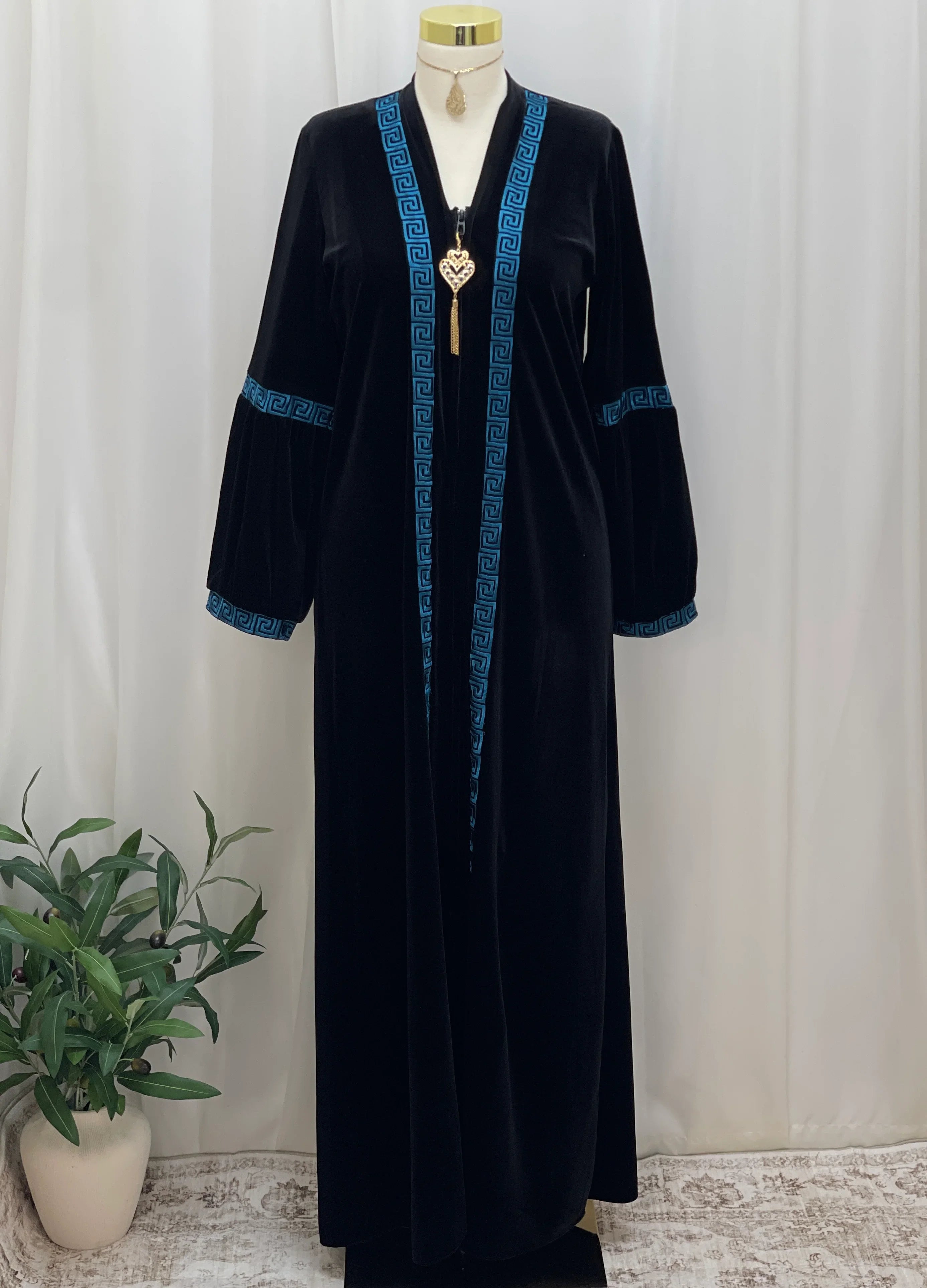 Aurelia Velvet Abaya-is a refined statement piece crafted from soft