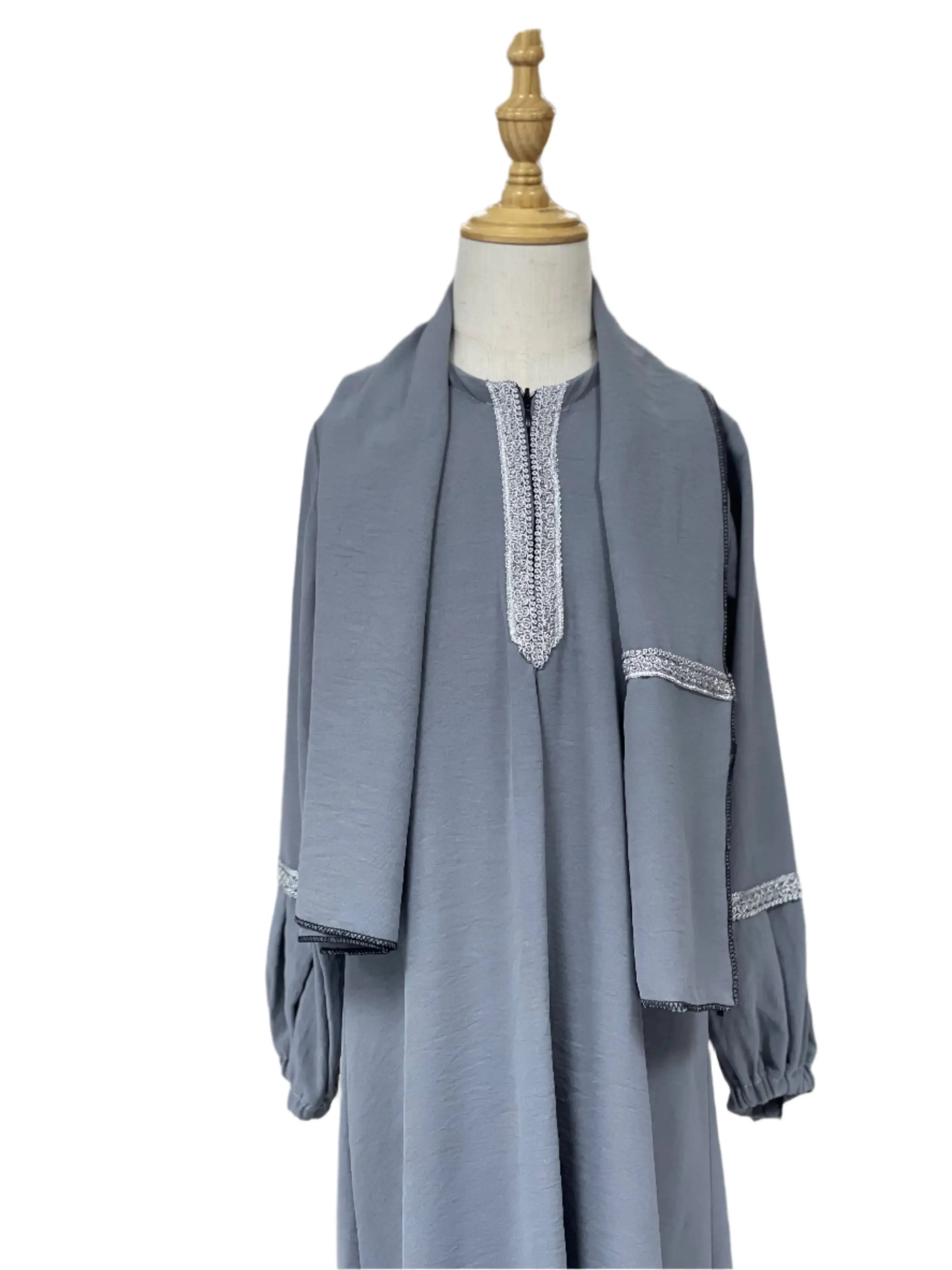 Palestinian Elegance girls embroidered abaya in gray with detailed white embroidery on neckline and sleeves