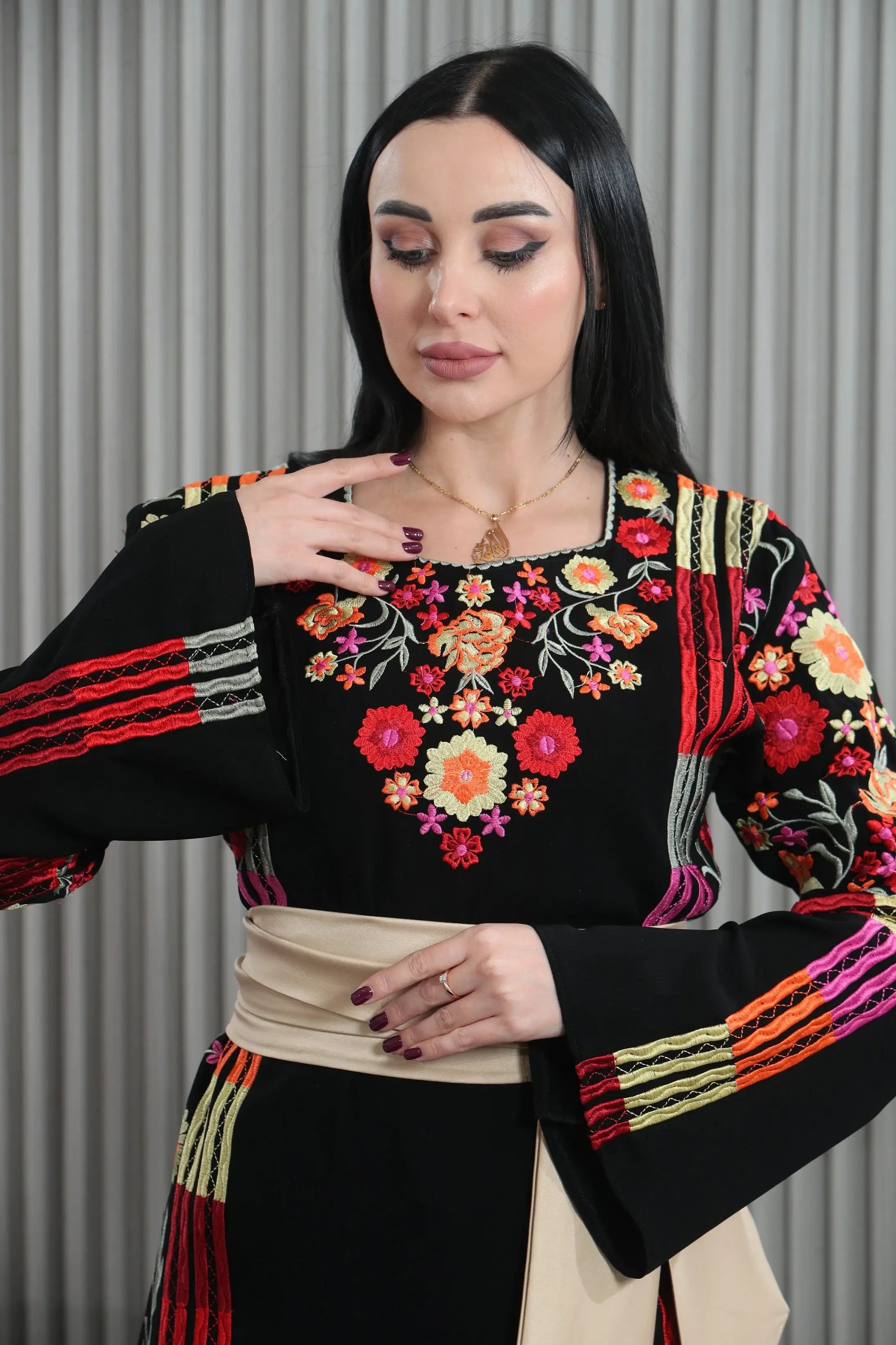 Vibrant Elegance: The Embroidered Multicolored Thoub Palestinian Elegance