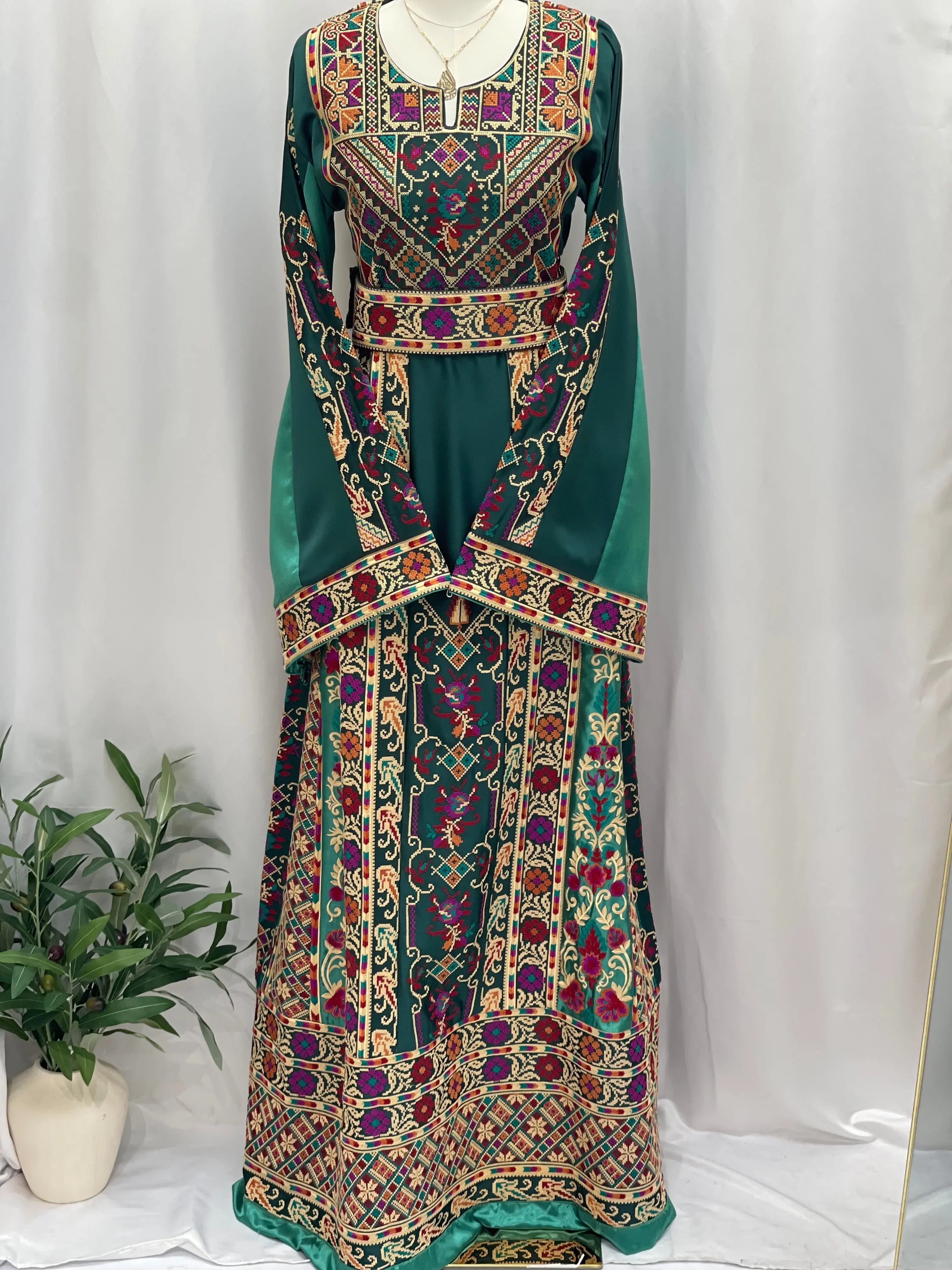 Distinctive Elegance: Unique Green Satin Silk Embroidered Thoub Palestinian Elegance