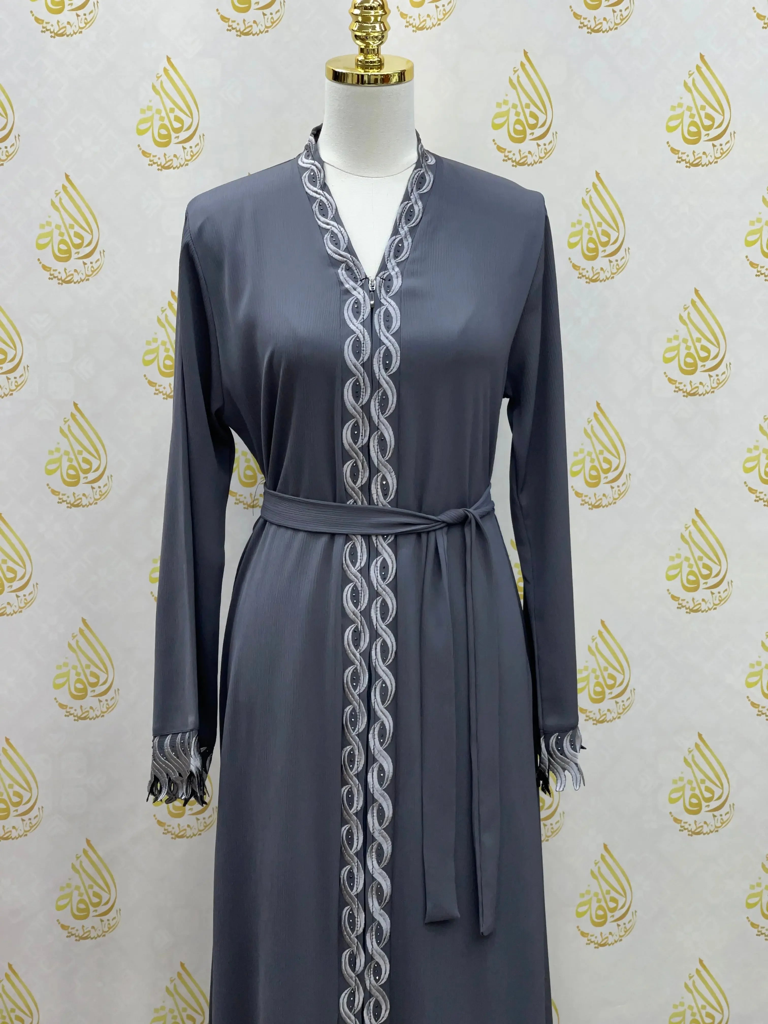 Palestinian Elegance gray elegant embroidered abaya with detailed embroidery along front and cuffs