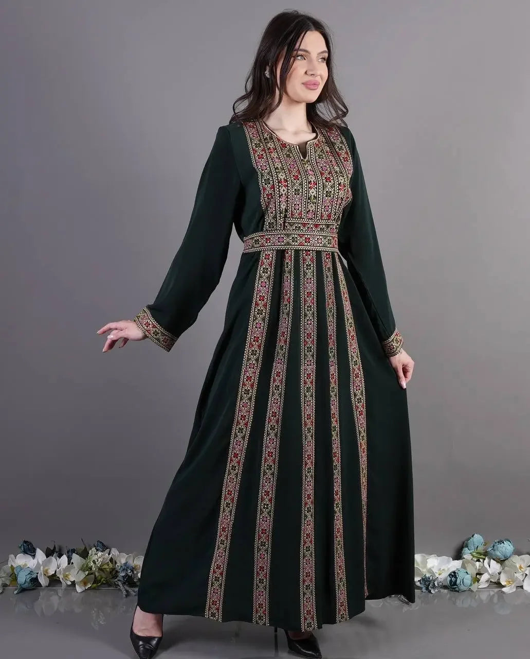 Palestinian Elegance embroidered abaya dress with intricate traditional patterns on black fabric