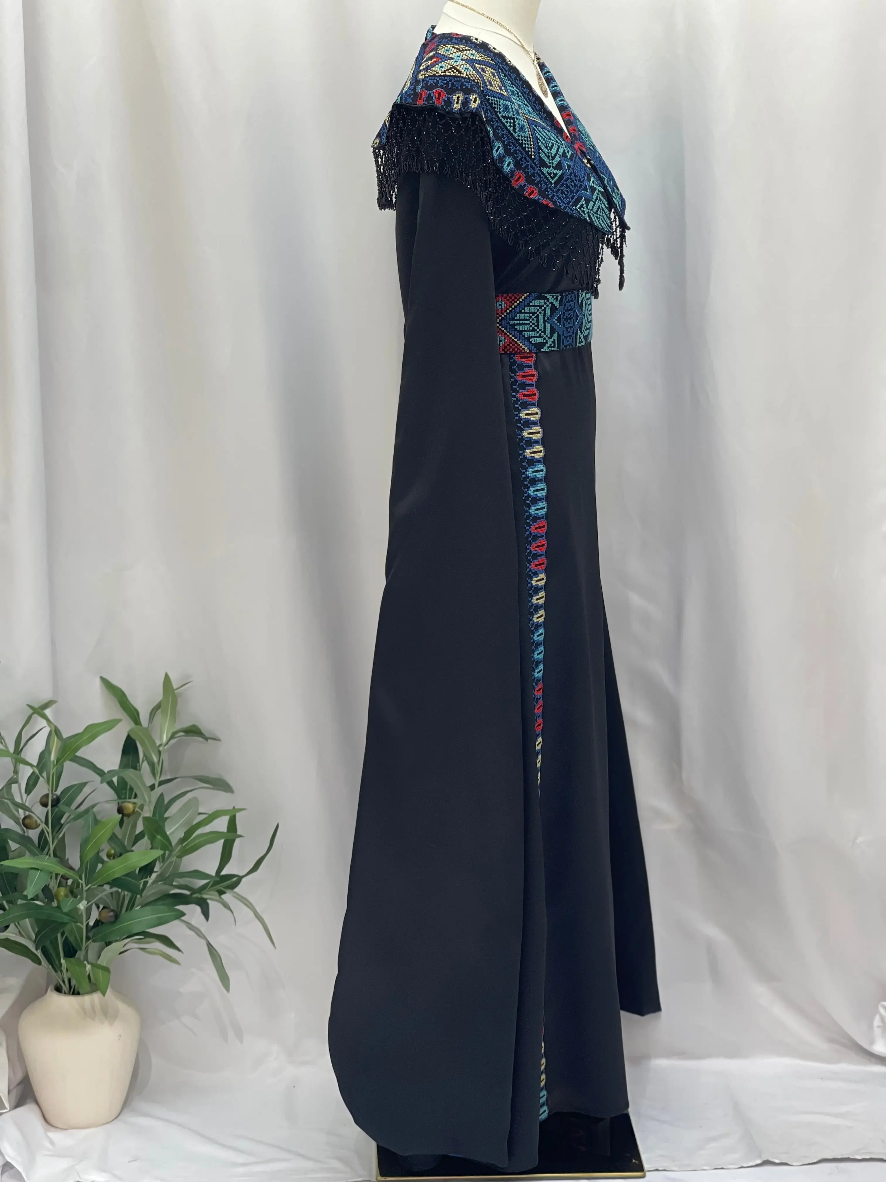 Sophisticated Elegance: Soondos Embroidered Satin Dress Palestinian Elegance