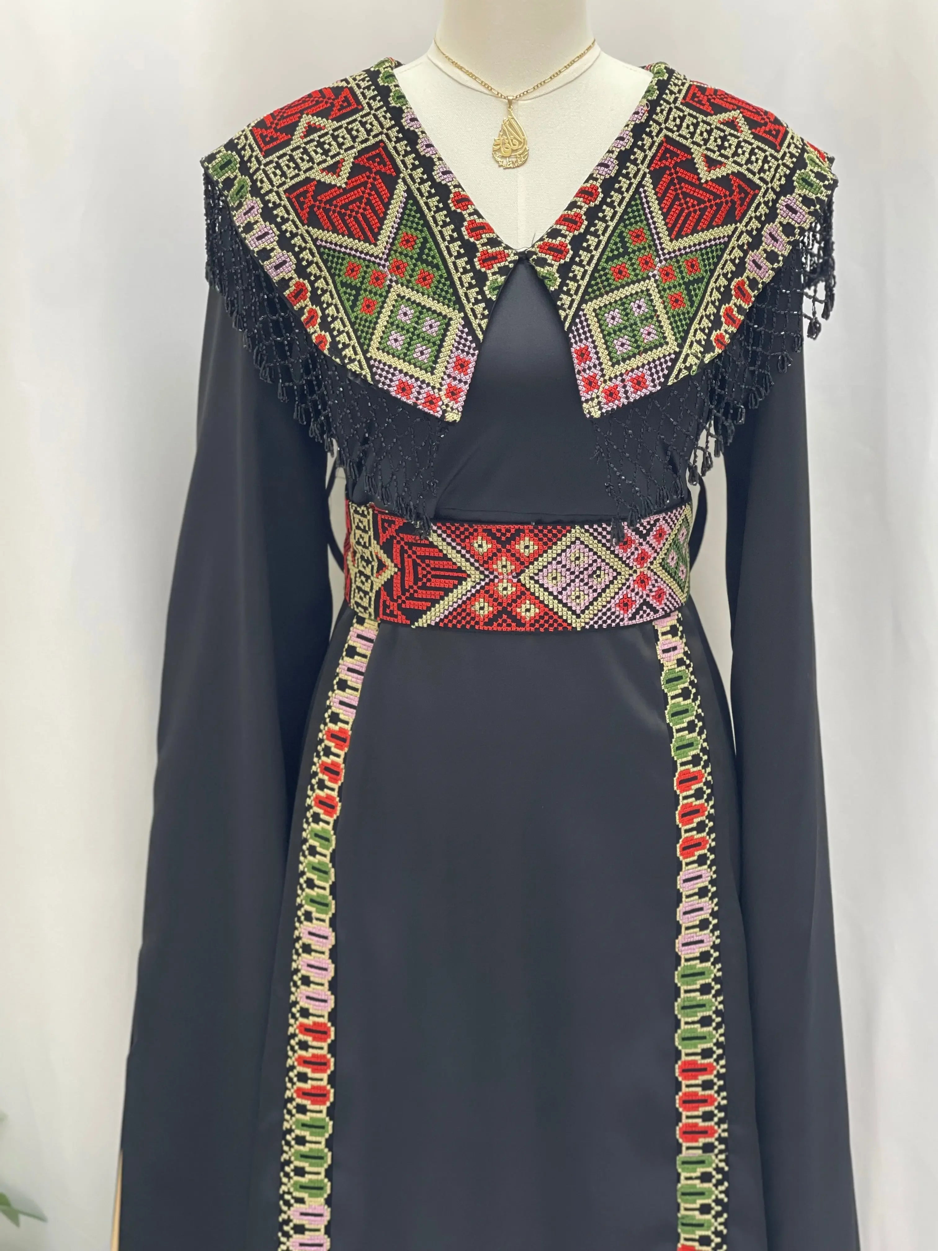 Sophisticated Elegance: Soondos Embroidered Satin Dress Palestinian Elegance