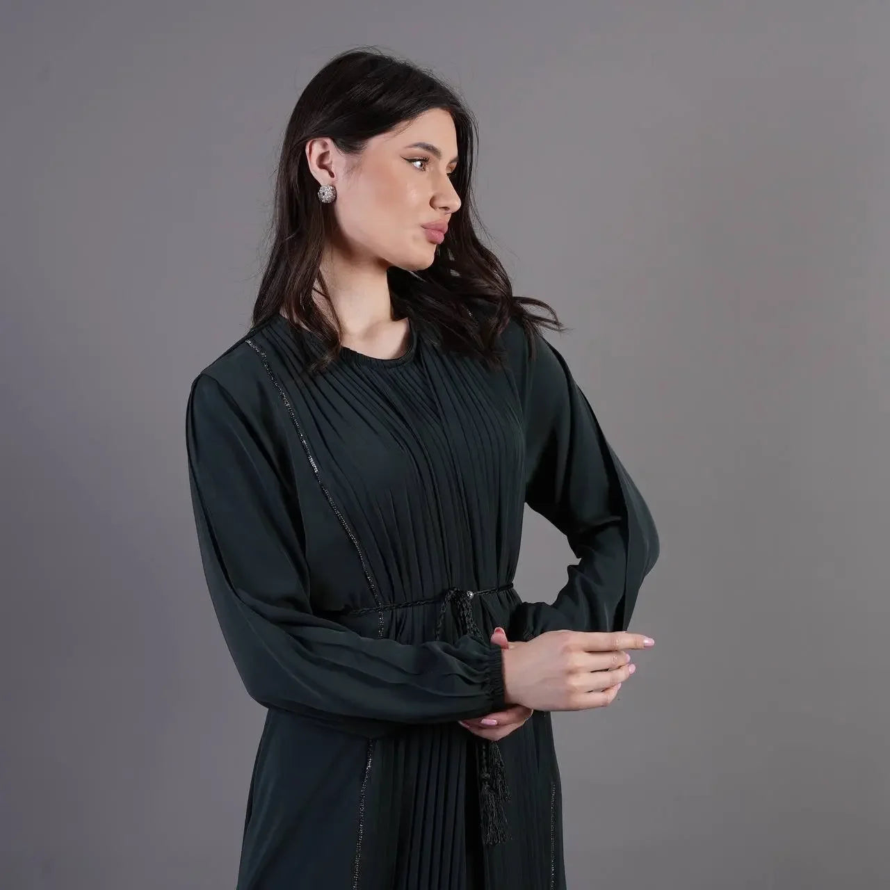 Palestinian Elegance black pleated abaya dress with long sleeves and detailed waist belt