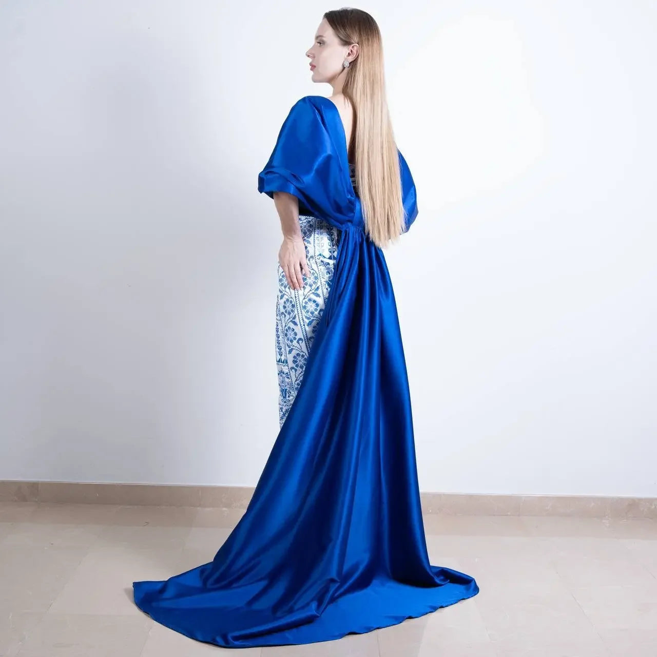 Embroidered Strapless Dress with Oversized Bow: Elegance and Sophistication Palestinian Elegance