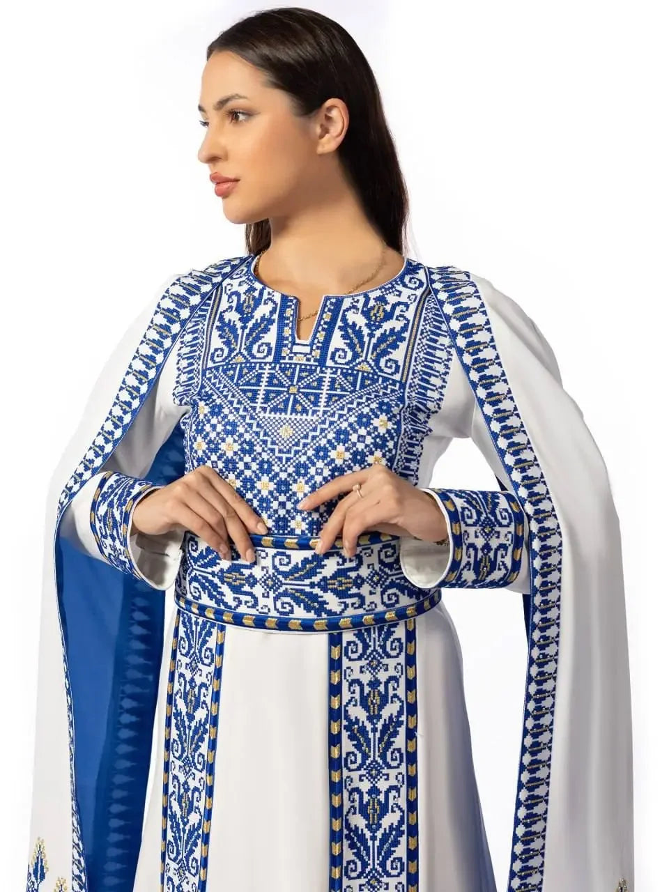 Embroidered Palestinian thobe dress in white and blue with intricate traditional embroidery by Palestinian Elegance