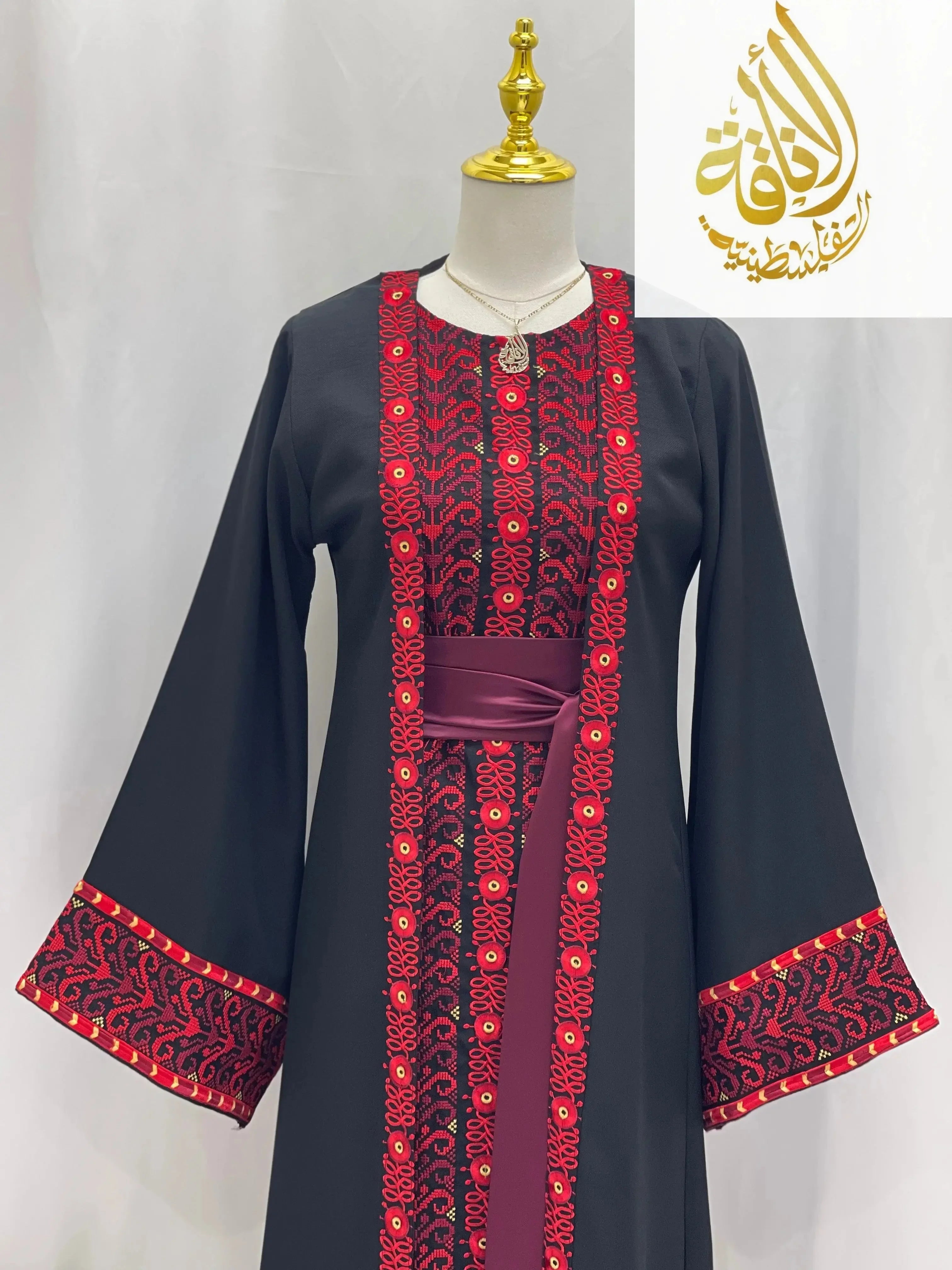 Palestinian Elegance embroidered 3-piece Ahlam modest dress outfit in black with red floral detailing and matching belt