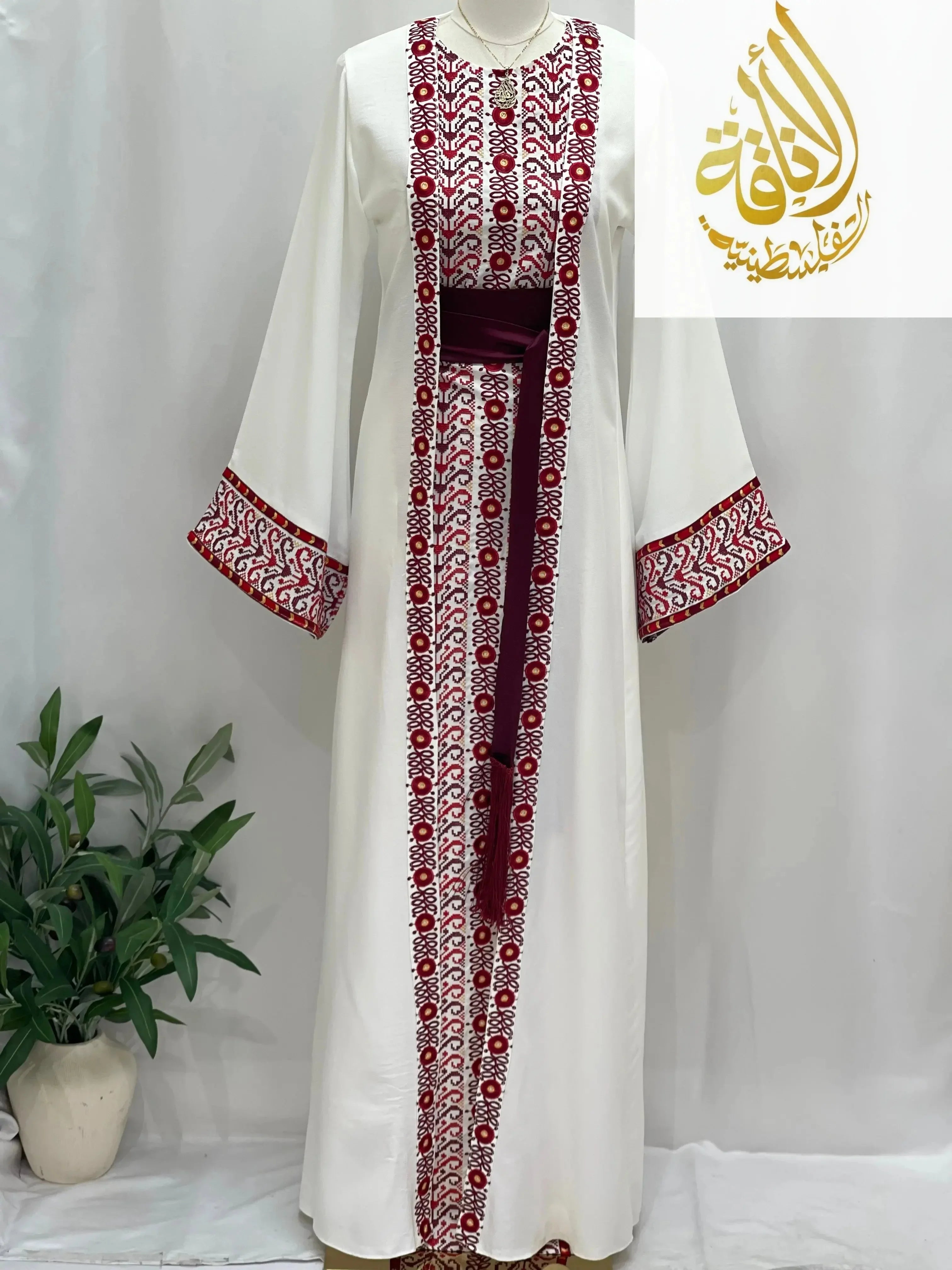 White embroidered 3-piece Ahlam modest dress outfit with red floral patterns and maroon belt by Palestinian Elegance