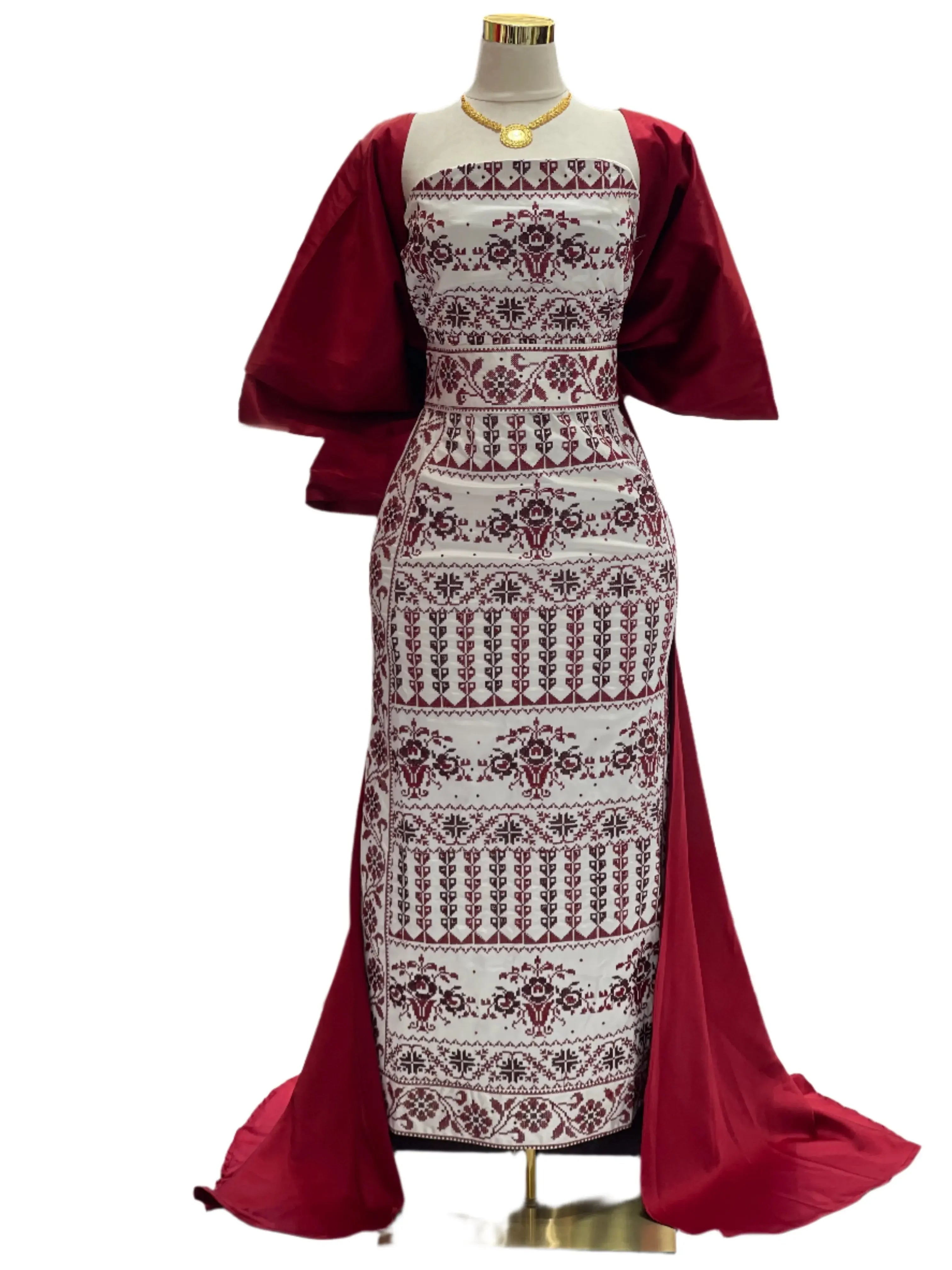 Embroidered Strapless Dress with Oversized Bow: Elegance and Sophistication Palestinian Elegance