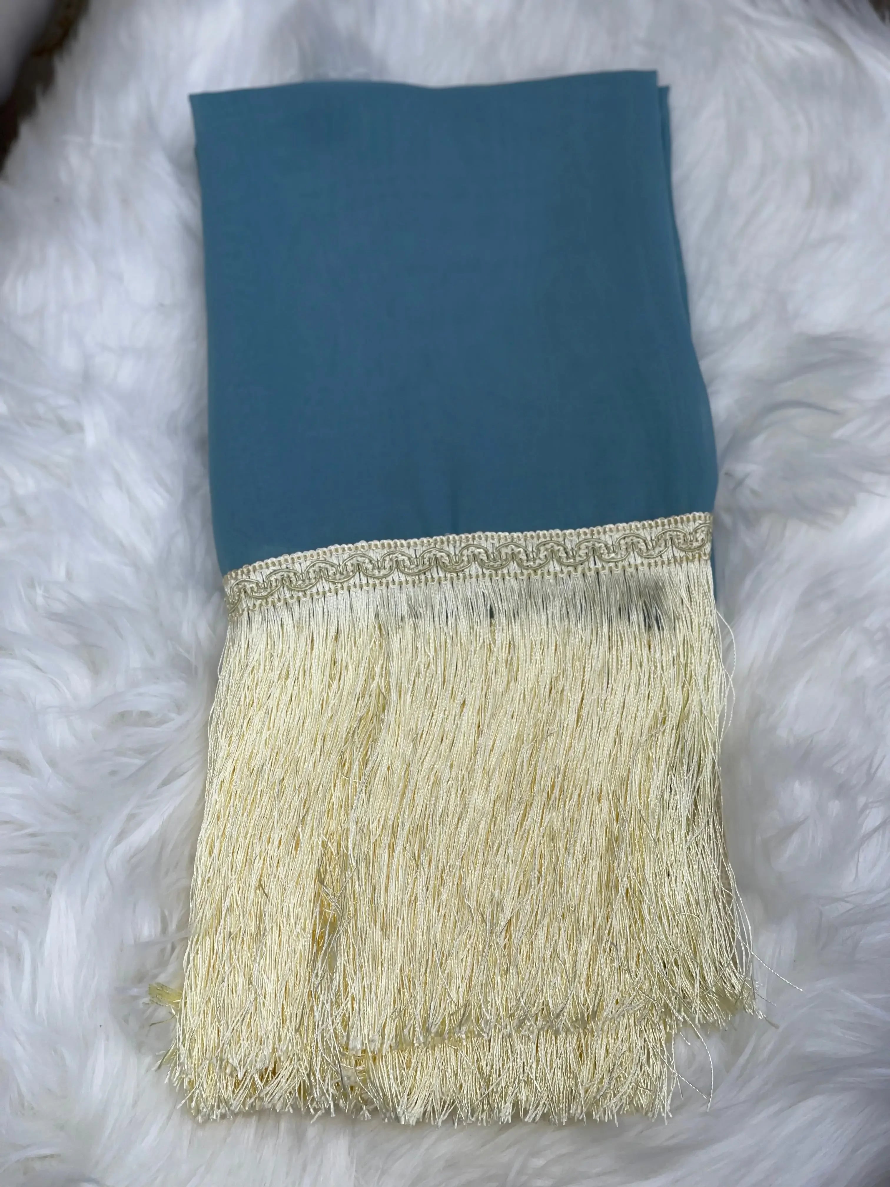 Traditional Palestinian khirka shawl in blue with cream fringe from Palestinian Elegance
