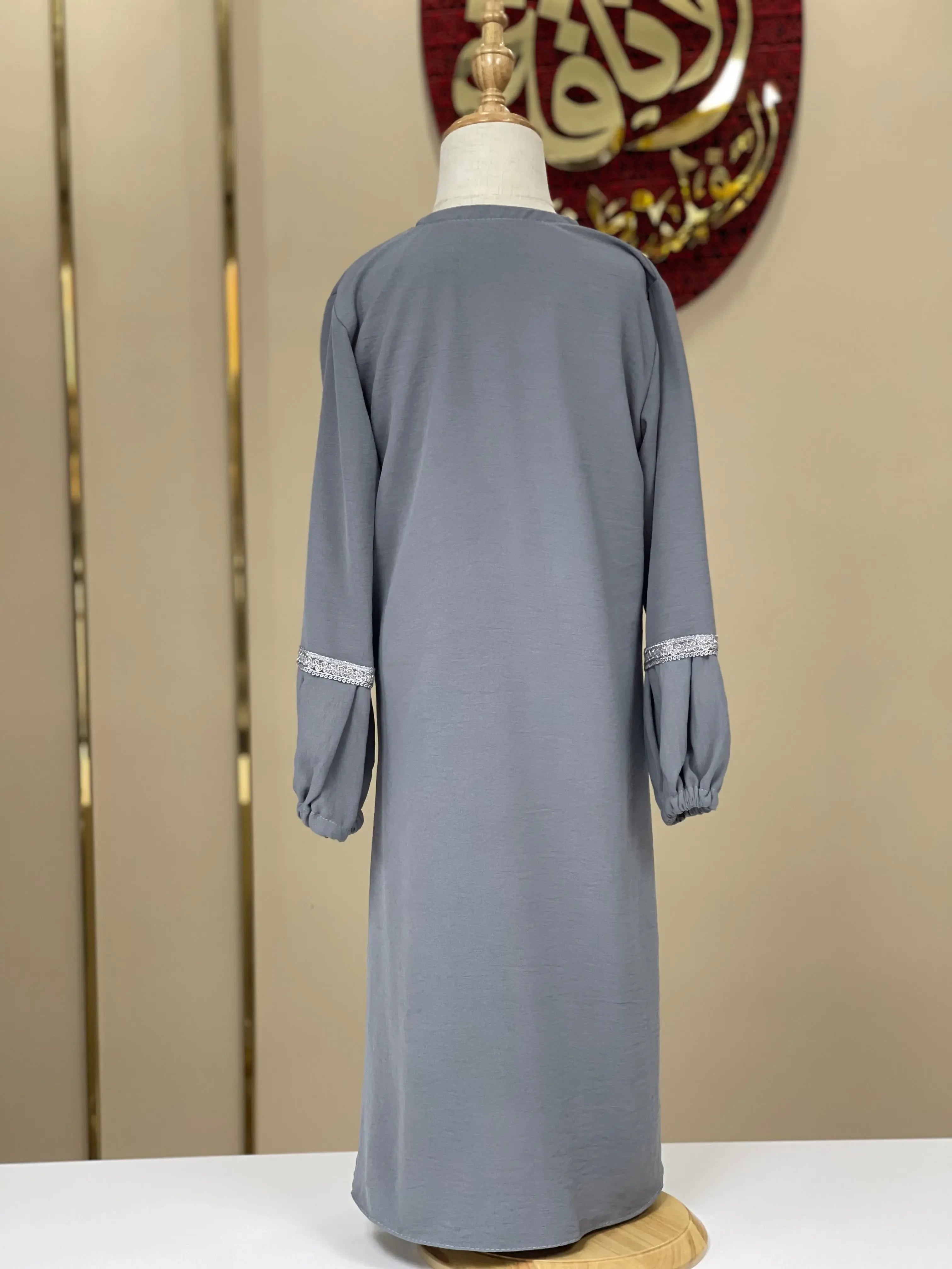 Back view of gray girls embroidered abaya with long sleeves by Palestinian Elegance