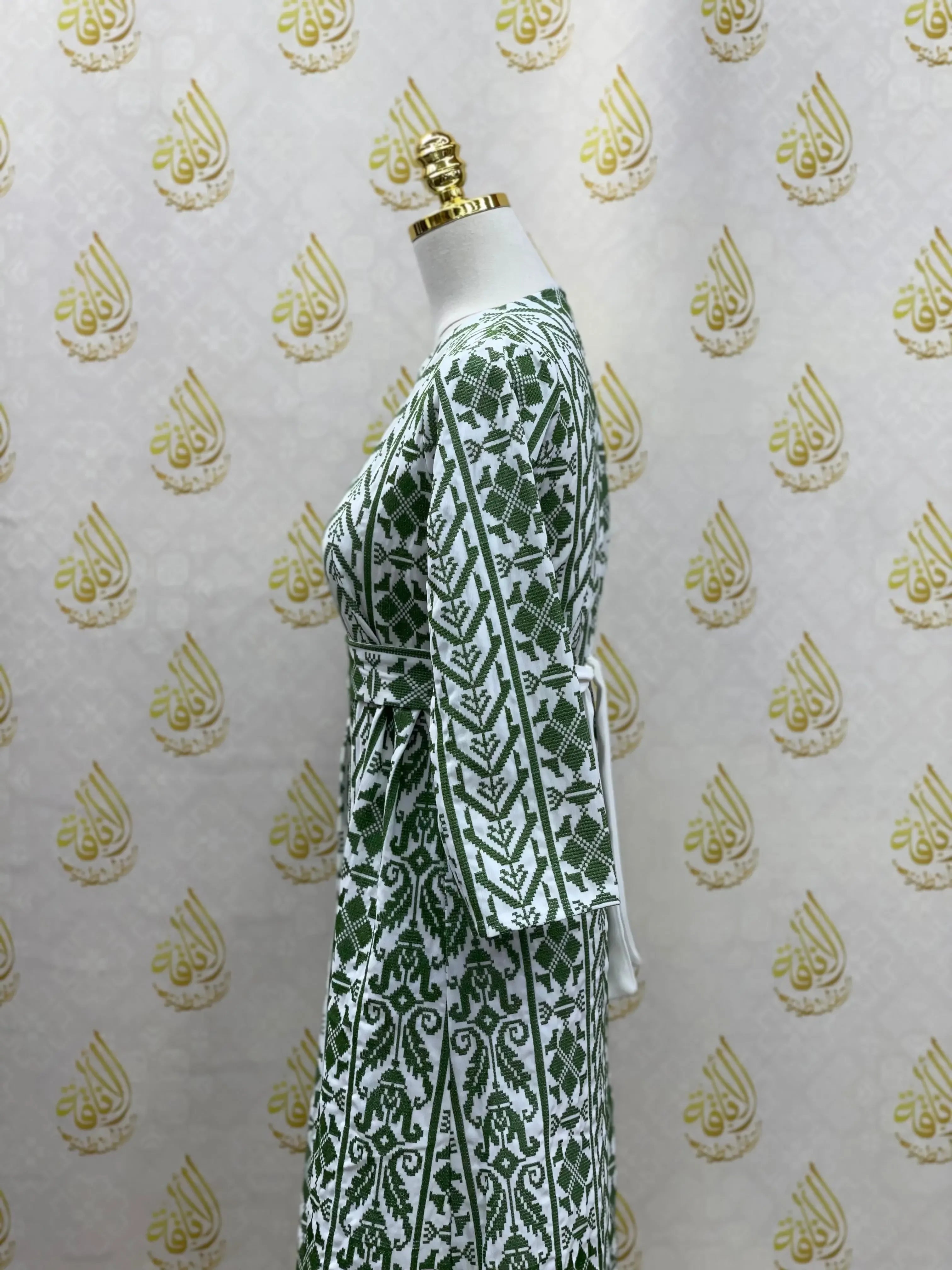 Palestinian Elegance embroidered cardigan for kids with detailed green and white traditional patterns