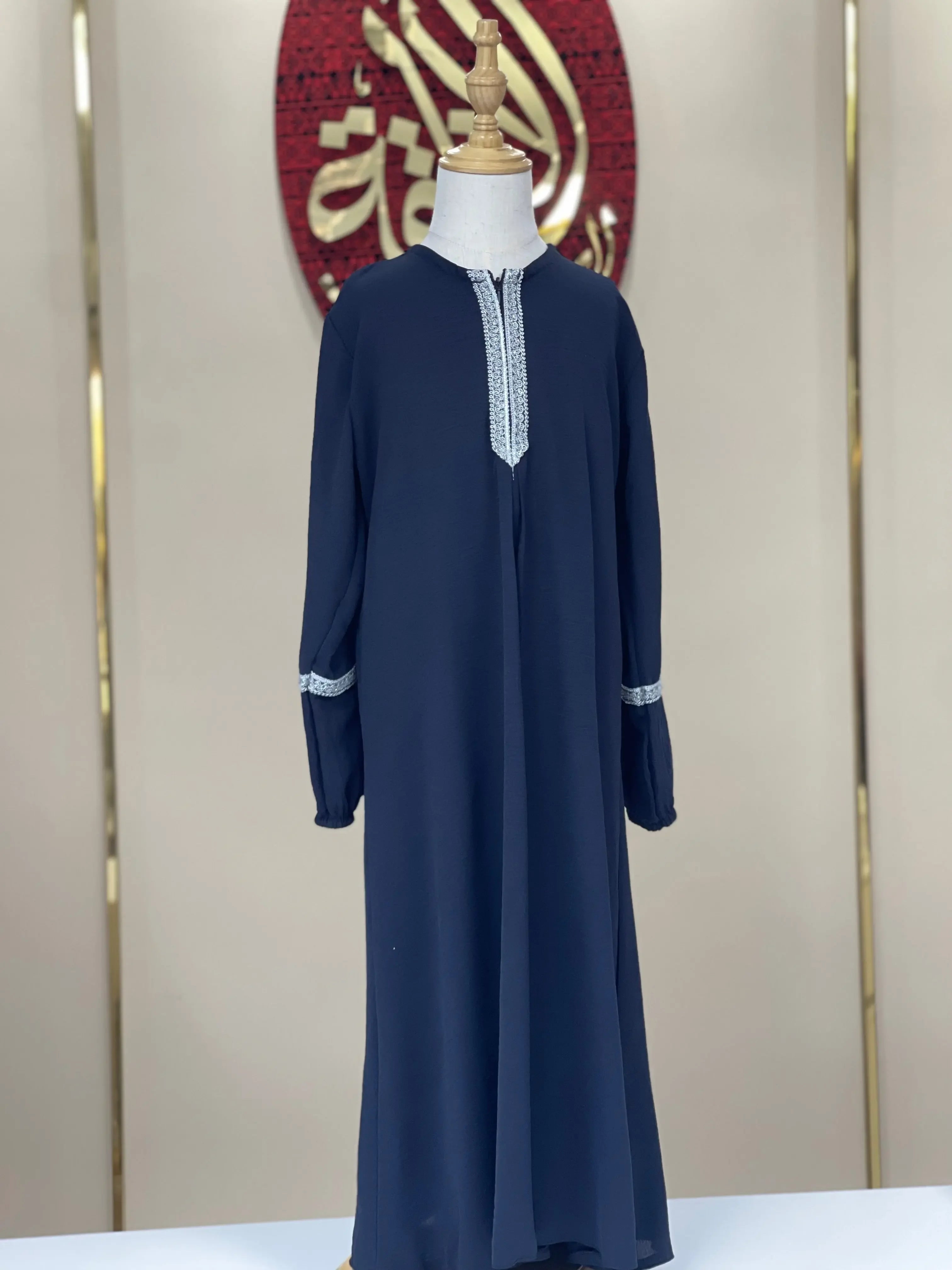 Palestinian Elegance girls embroidered abaya in navy with white detailed embroidery on neckline and cuffs