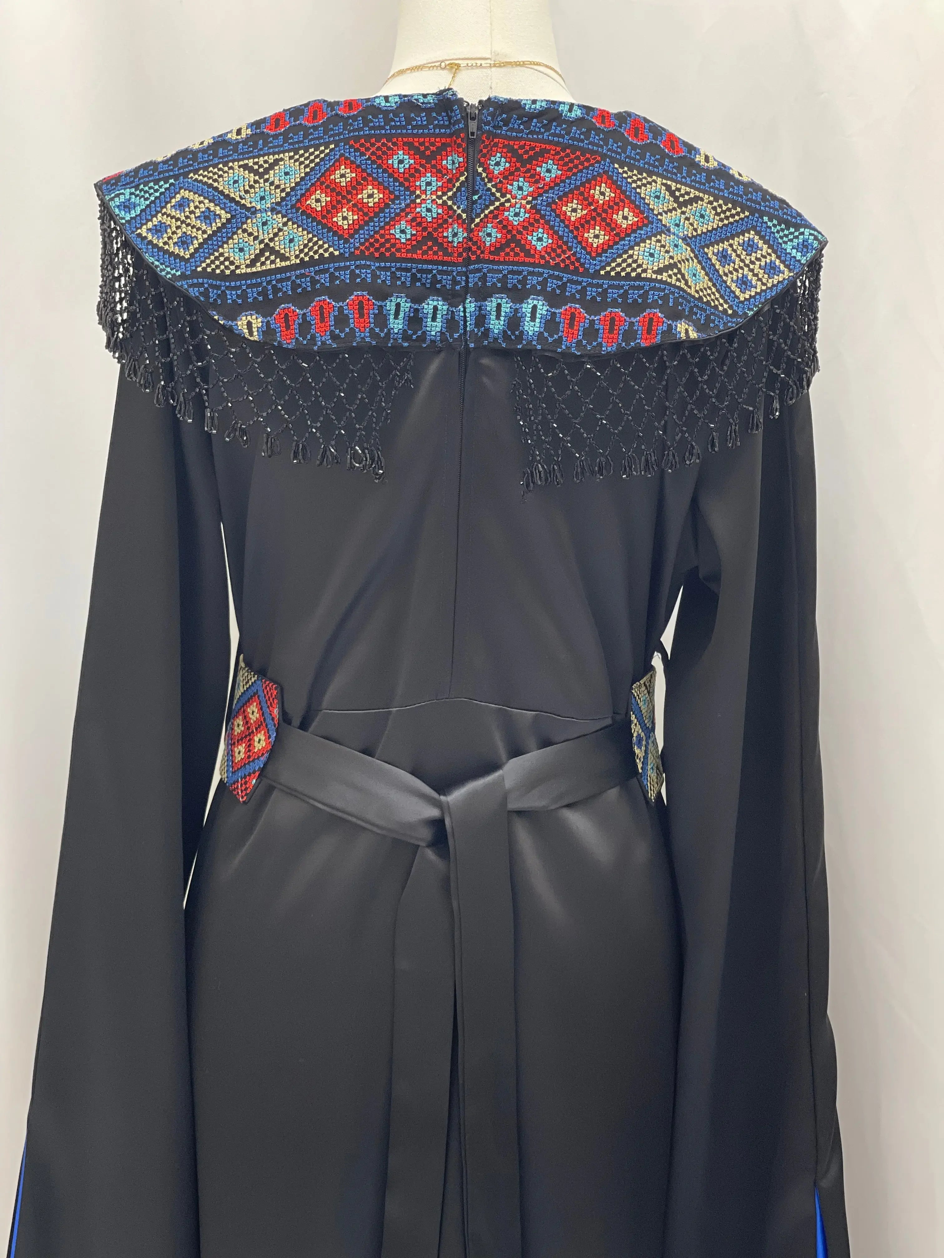 Sophisticated Elegance: Soondos Embroidered Satin Dress Palestinian Elegance