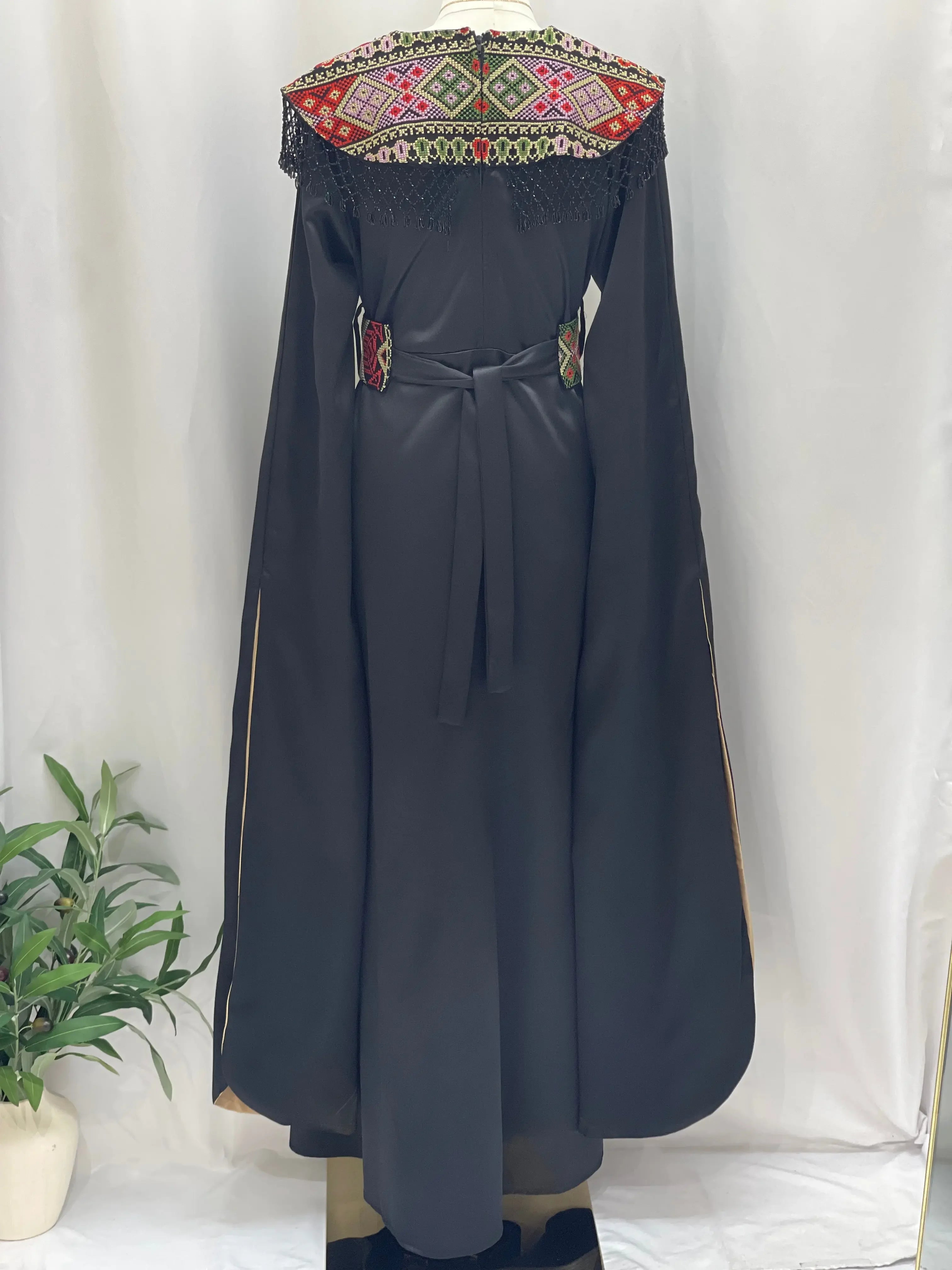 Sophisticated Elegance: Soondos Embroidered Satin Dress Palestinian Elegance