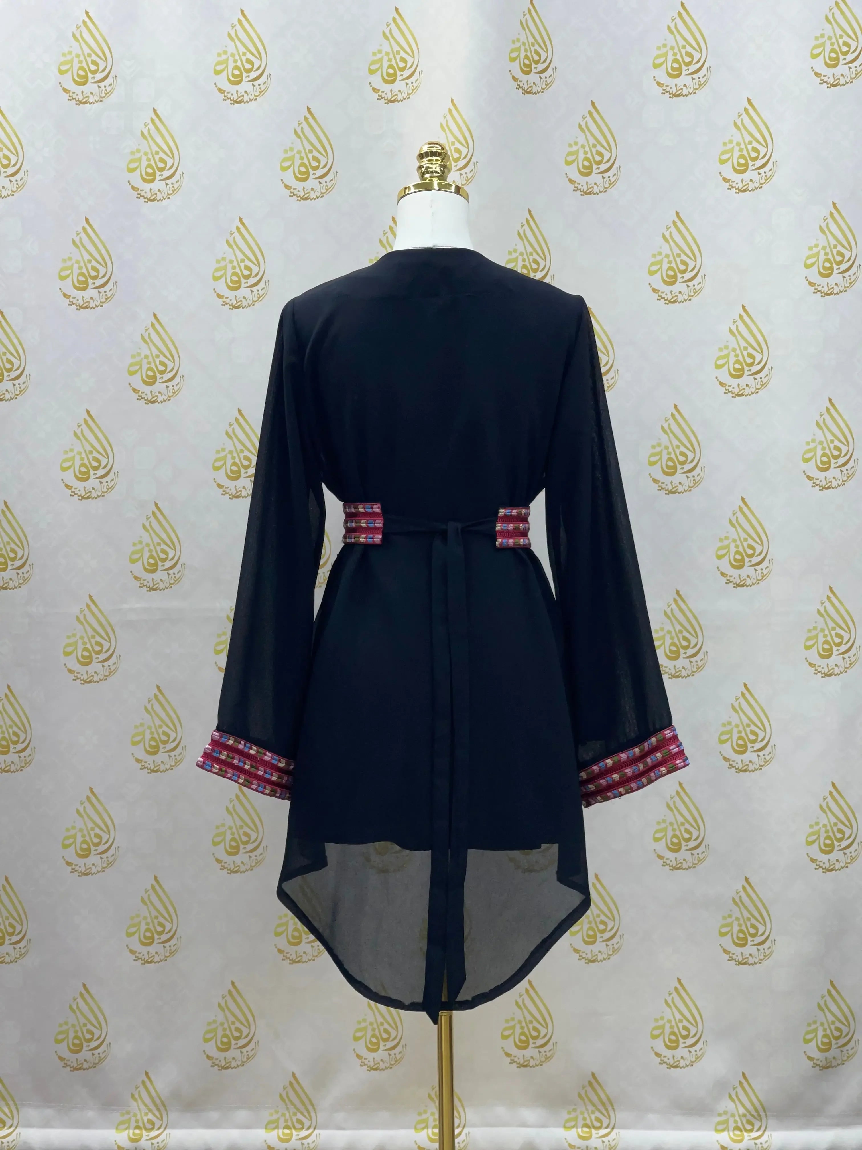 Black embroidered chiffon kimono cardigan by Palestinian Elegance with detailed sleeve and waist accents