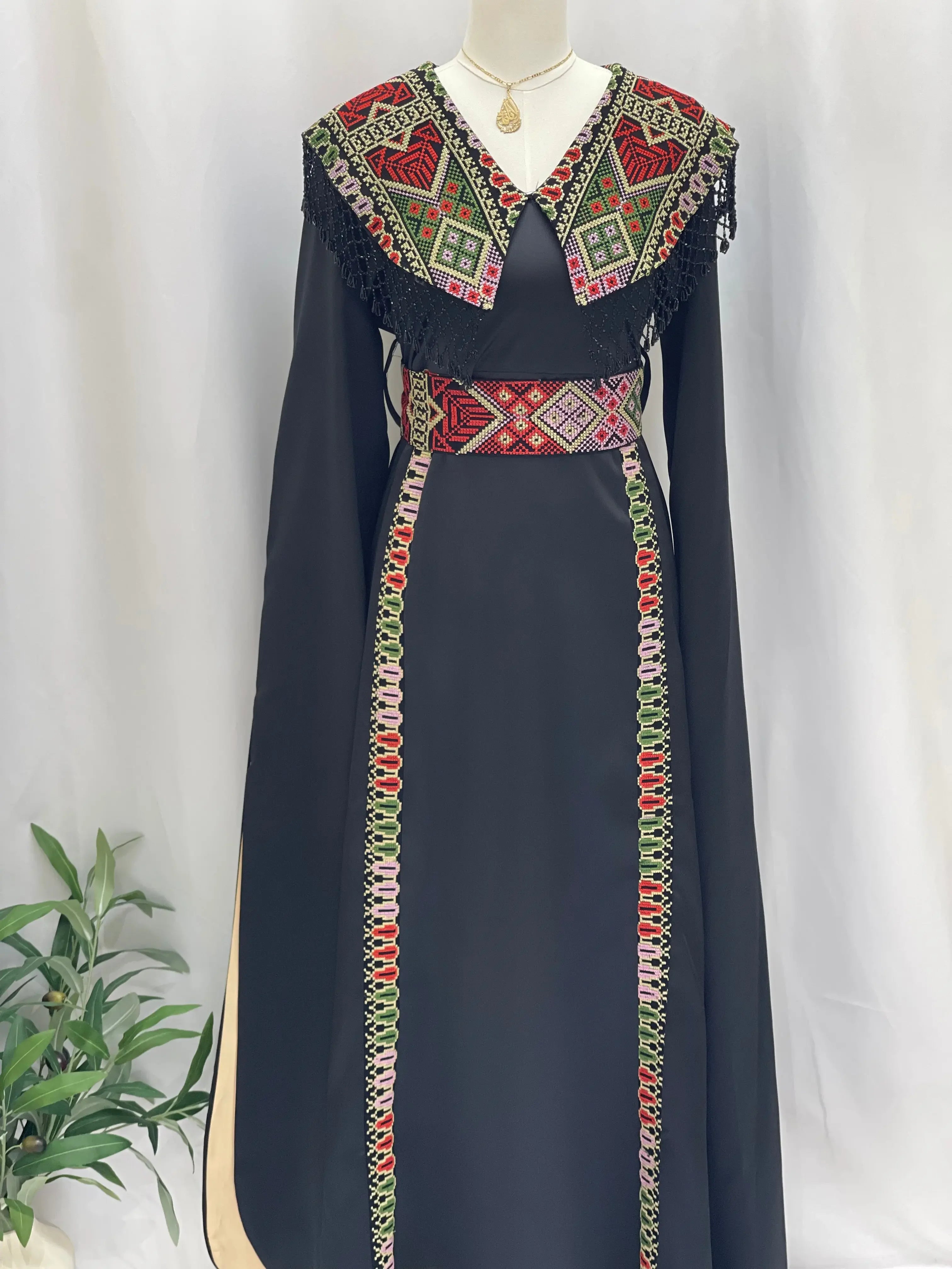 Sophisticated Elegance: Soondos Embroidered Satin Dress Palestinian Elegance
