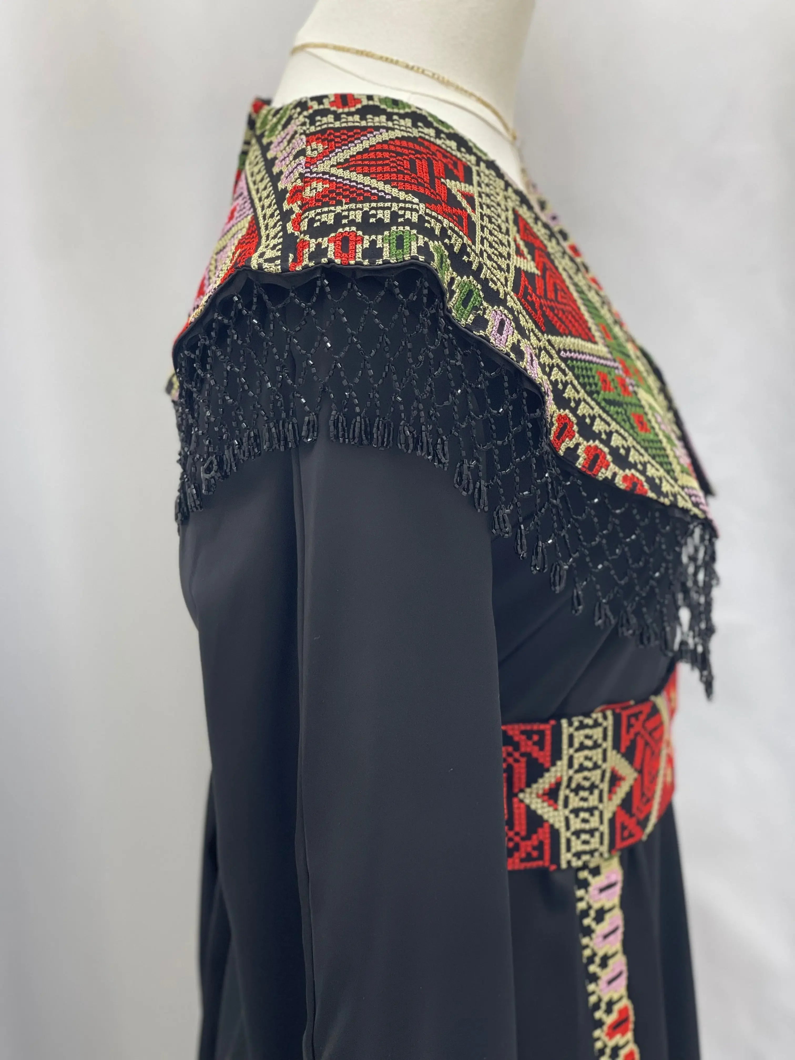 Sophisticated Elegance: Soondos Embroidered Satin Dress Palestinian Elegance
