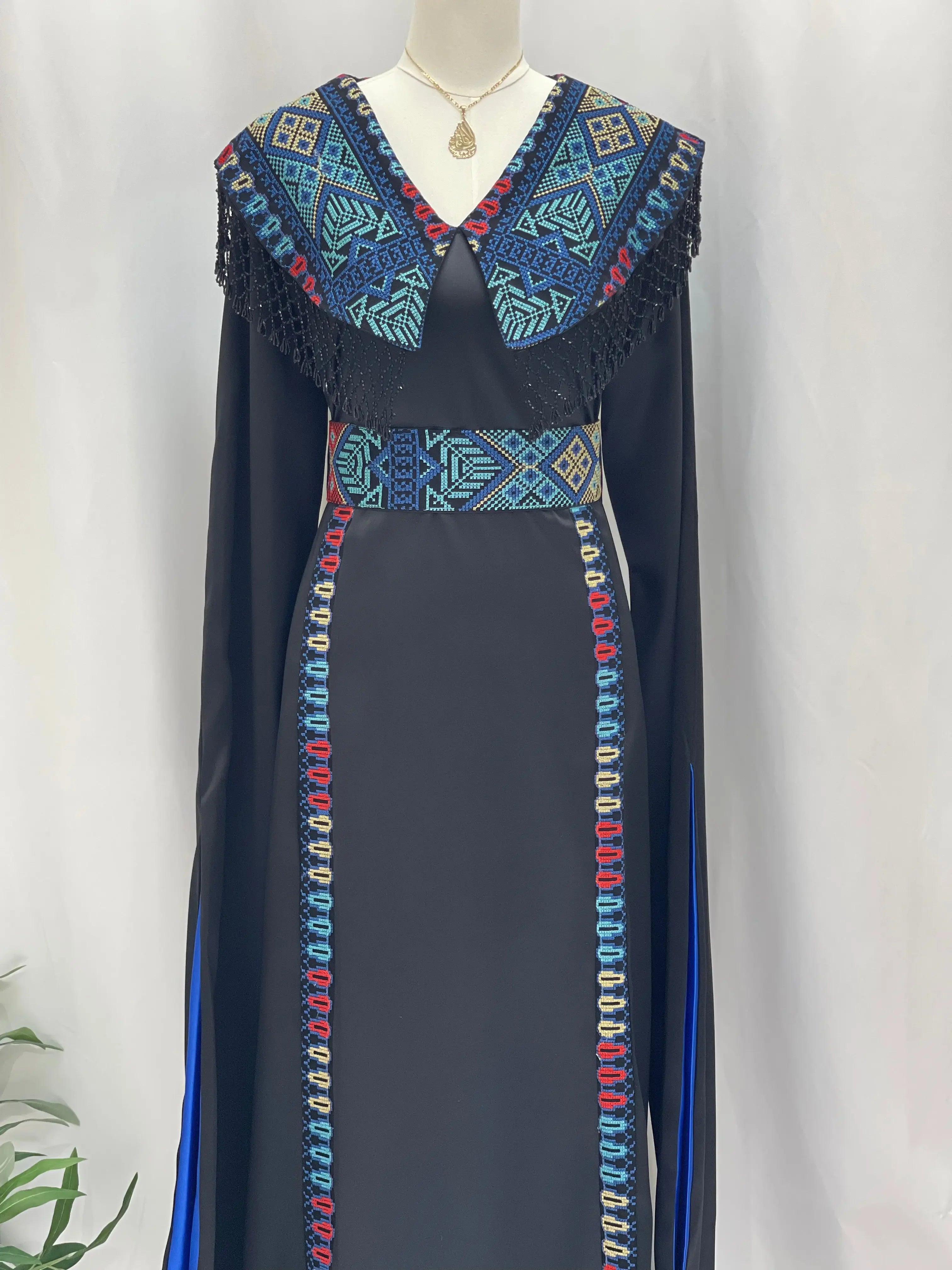 Sophisticated Elegance: Soondos Embroidered Satin Dress Palestinian Elegance