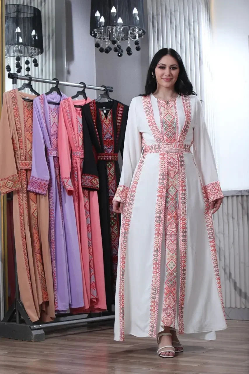 Palestinian Elegance embroidered abaya for women in white with pink and beige geometric patterns