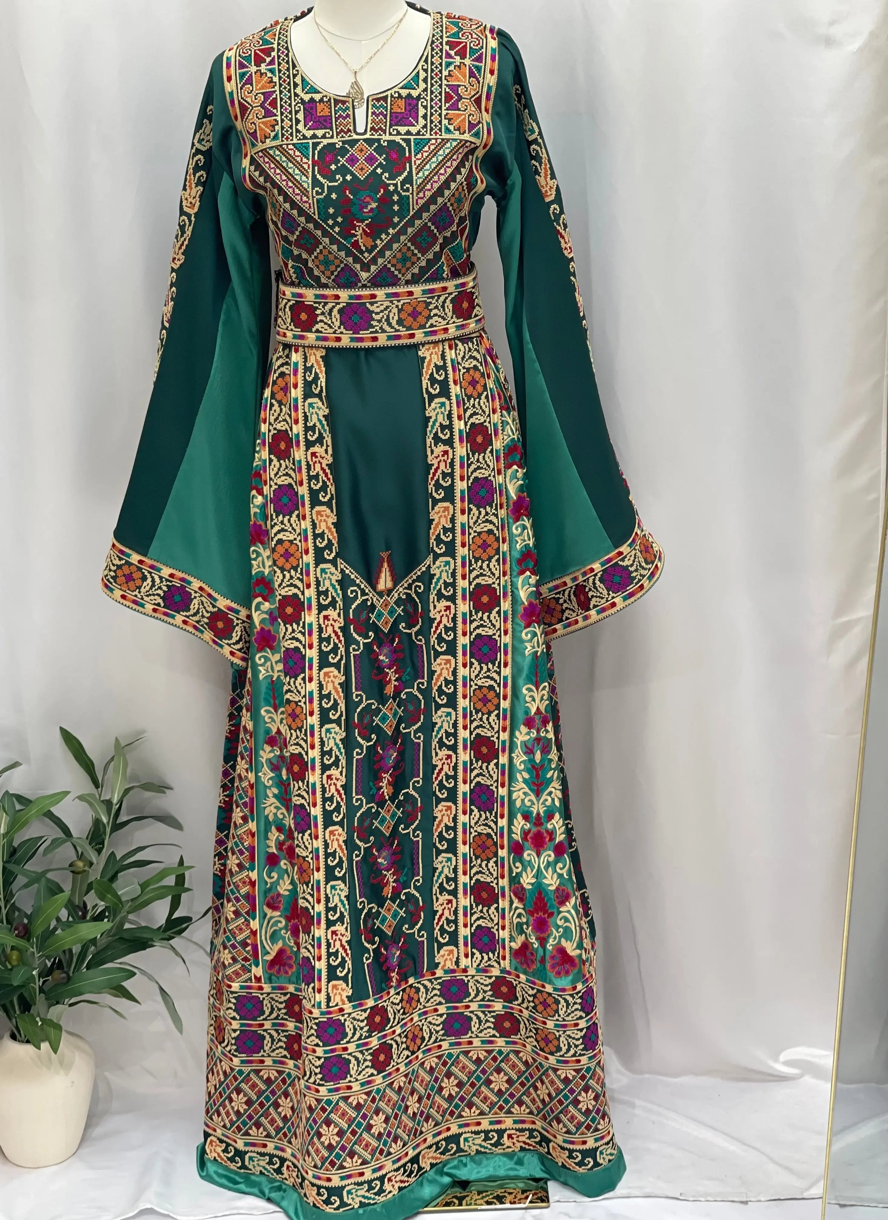 Distinctive Elegance: Unique Green Satin Silk Embroidered Thoub Palestinian Elegance
