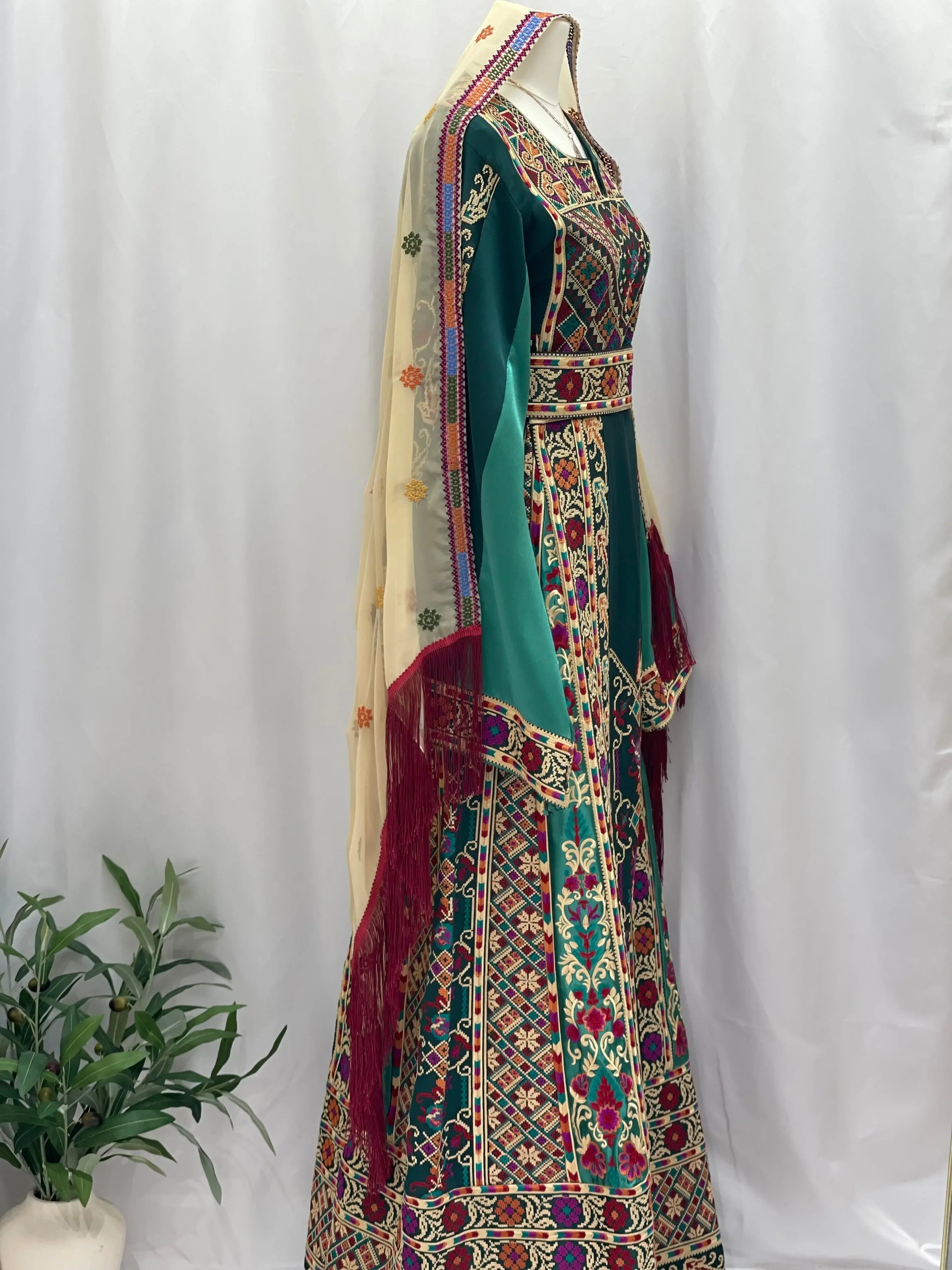 Distinctive Elegance: Unique Green Satin Silk Embroidered Thoub Palestinian Elegance
