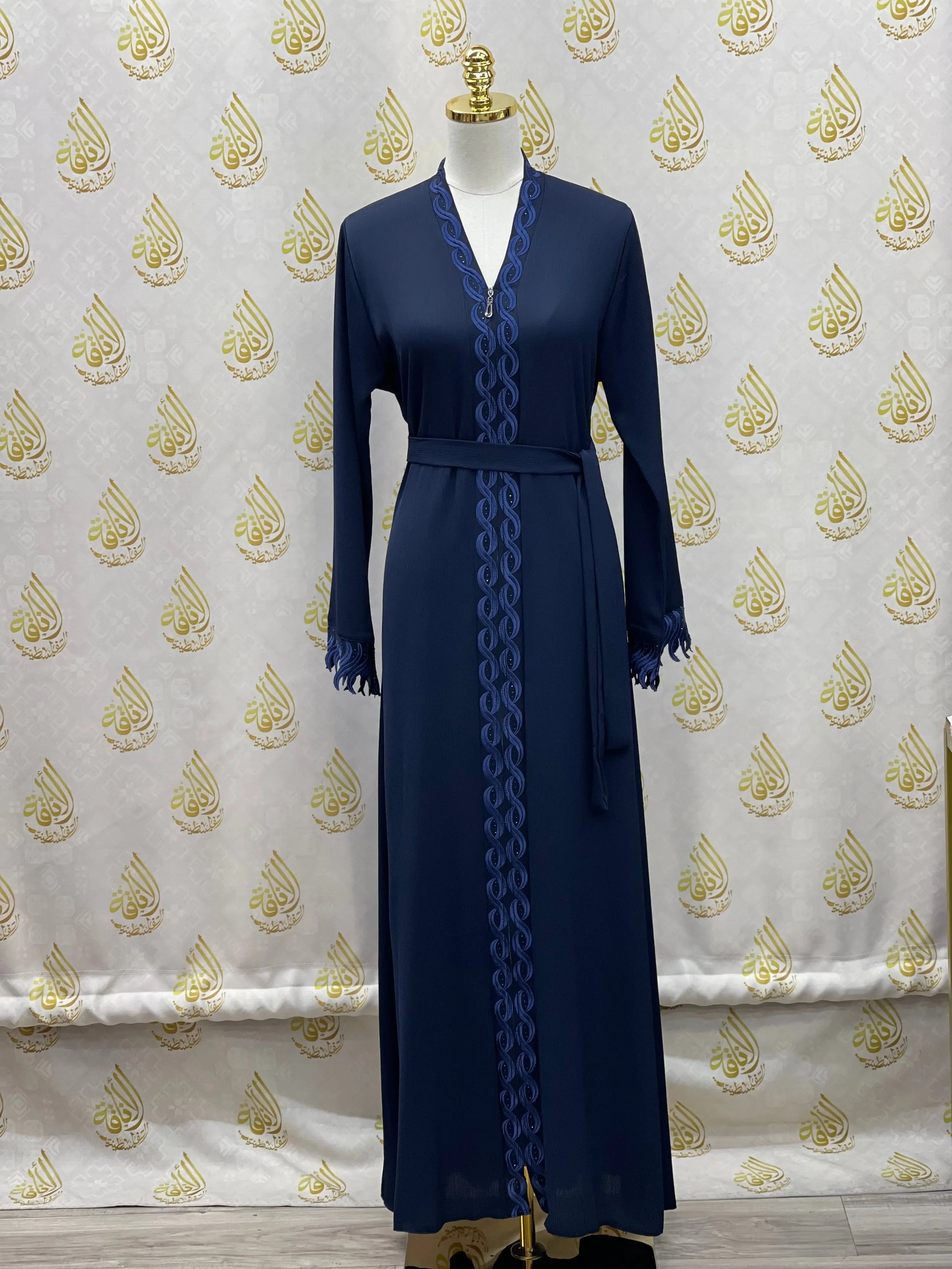 Palestinian Elegance elegant embroidered abaya in navy blue with detailed sleeve and front embroidery