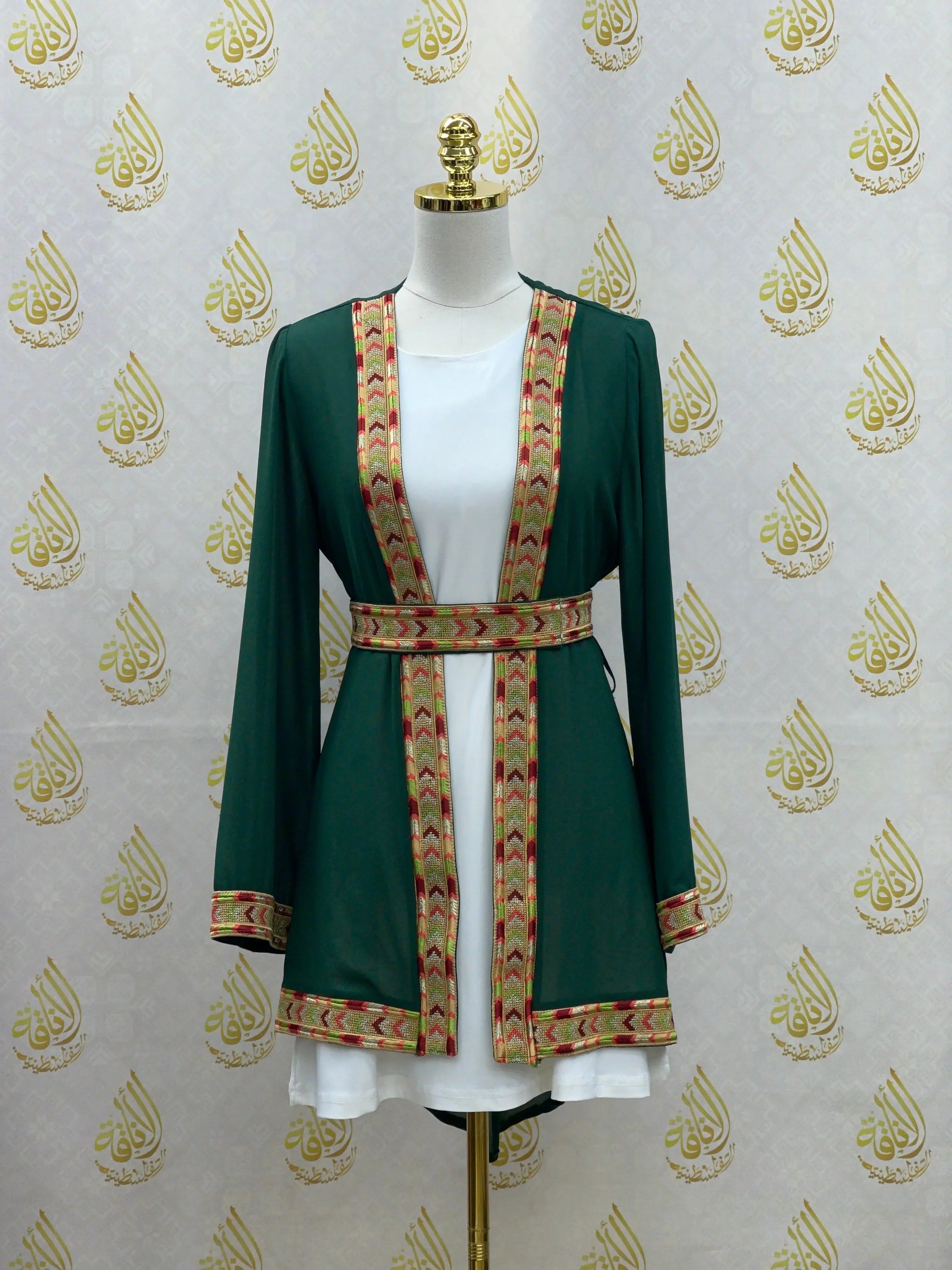 Palestinian Elegance embroidered chiffon kimono cardigan in dark green with intricate patterned trim and belt