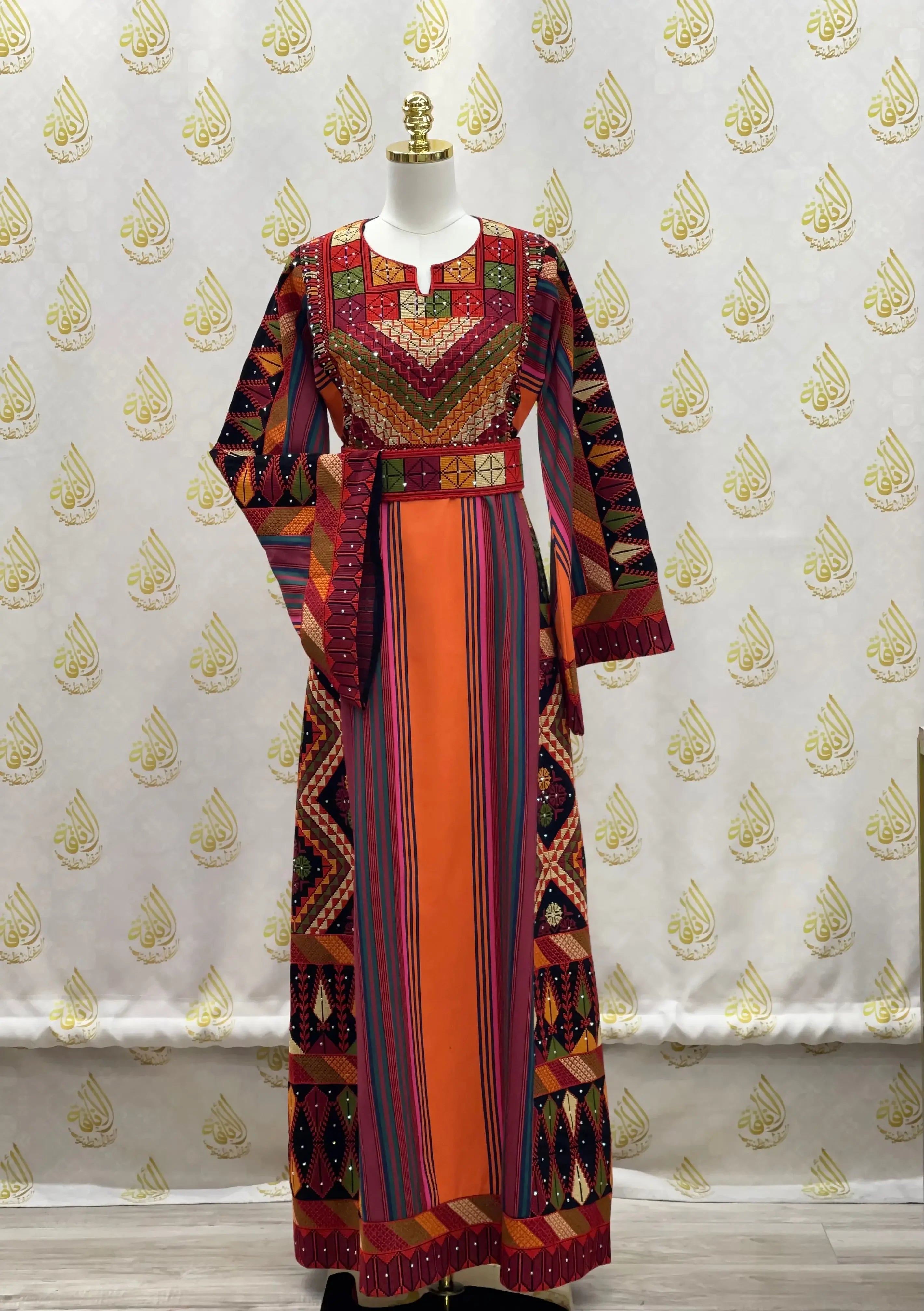 Luxury Palestinian thoub dress featuring colorful traditional embroidery by Palestinian Elegance