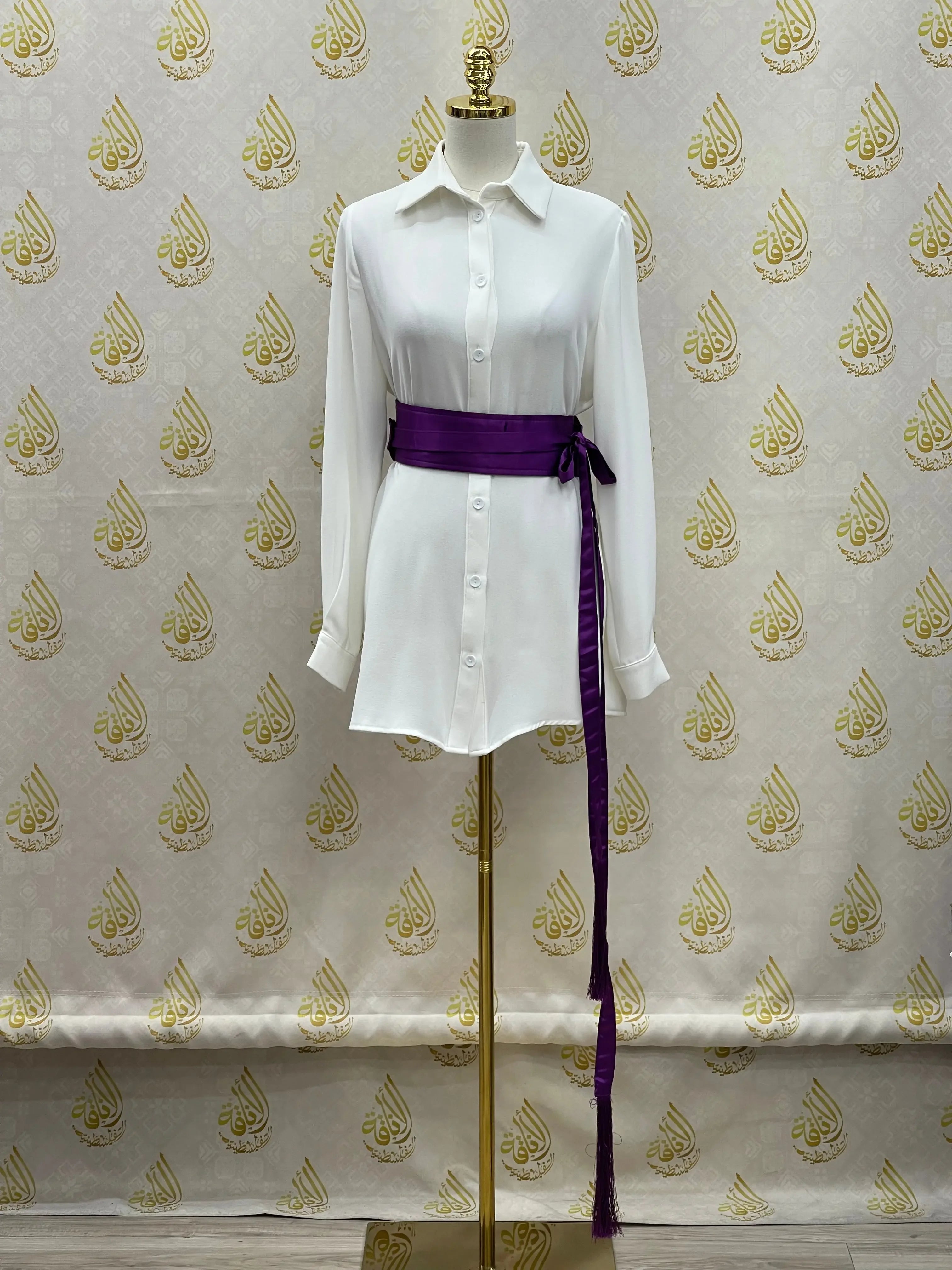 Luxury satin belt for dresses in deep purple styled on white shirt dress by Palestinian Elegance