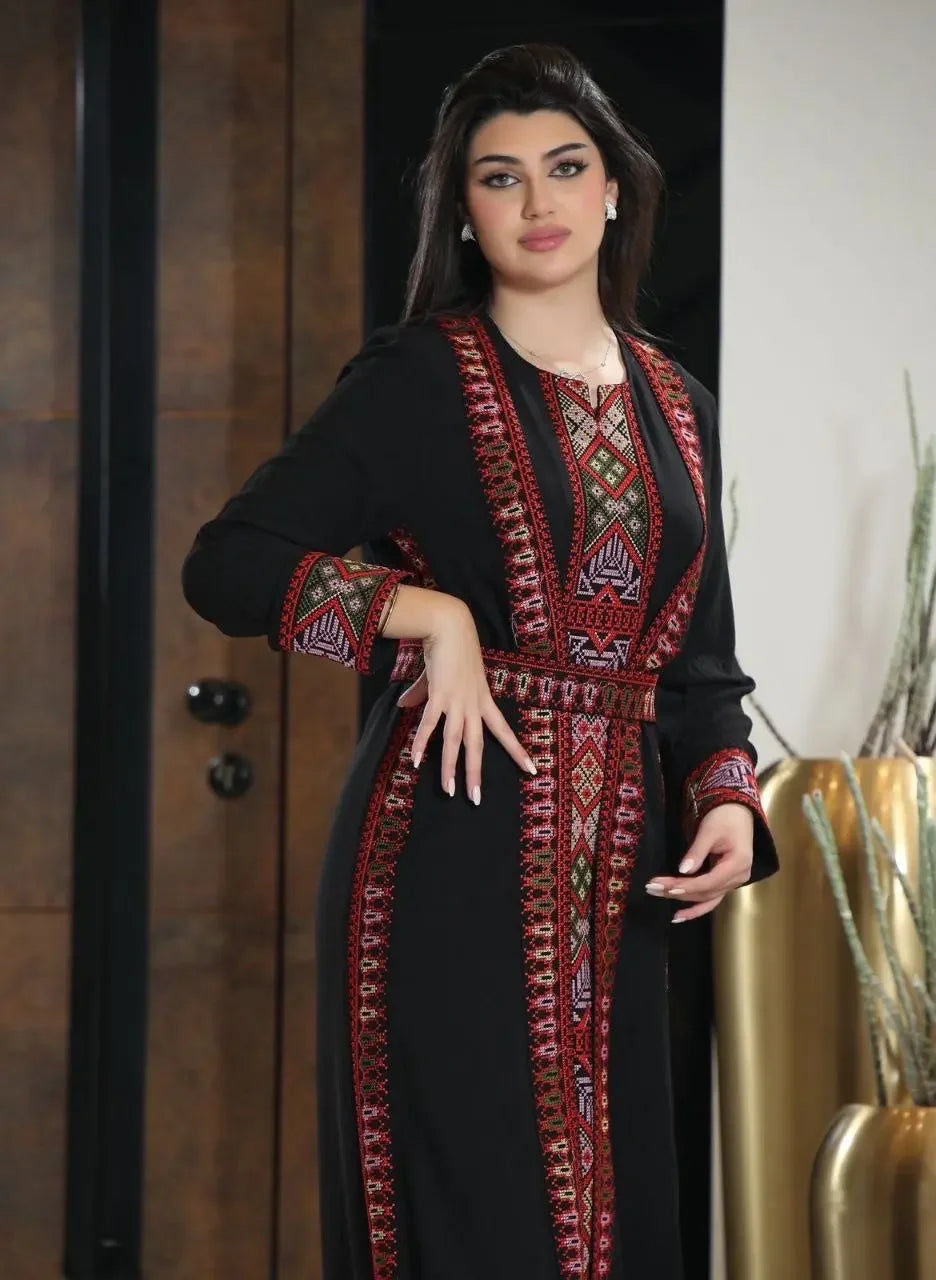 Palestinian Elegance embroidered abaya for women in black with intricate red and multicolor embroidery details