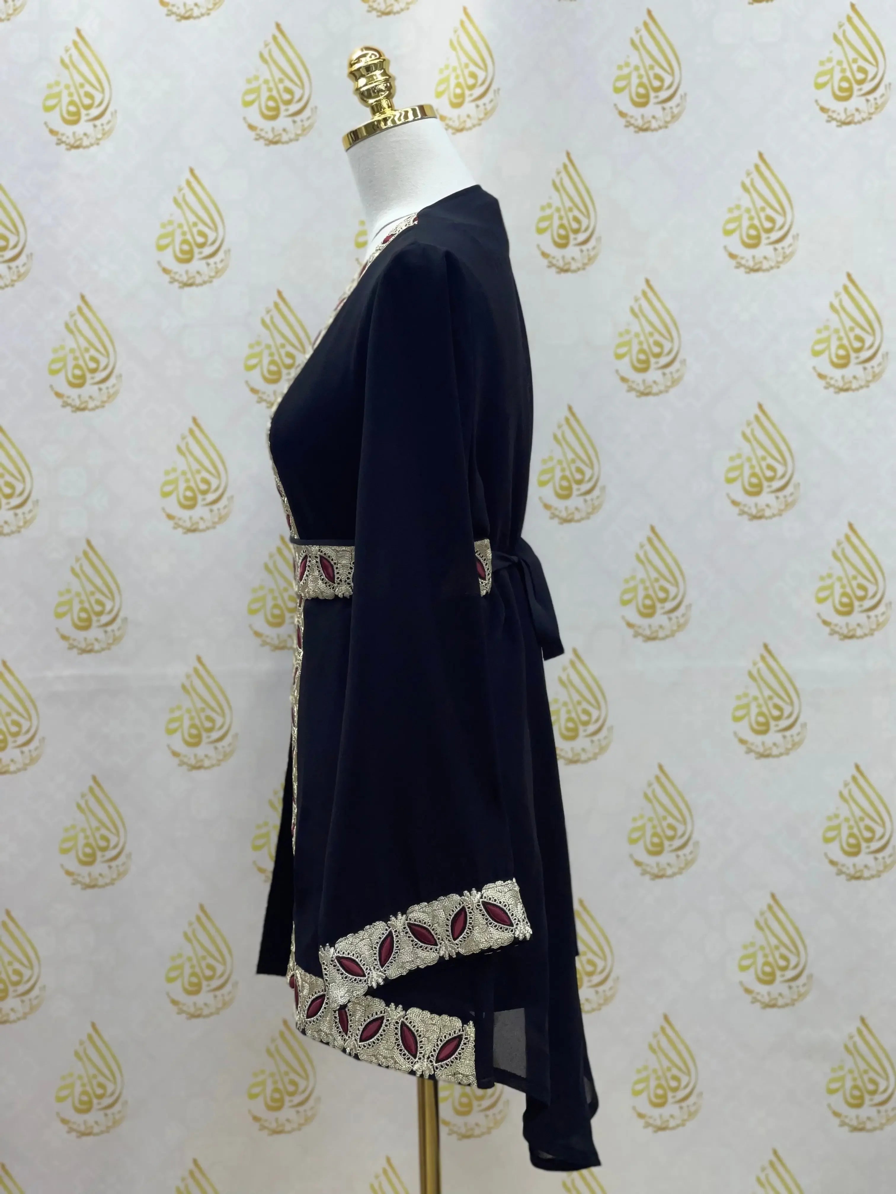 Palestinian Elegance embroidered chiffon kimono cardigan with detailed red and white trim on black fabric