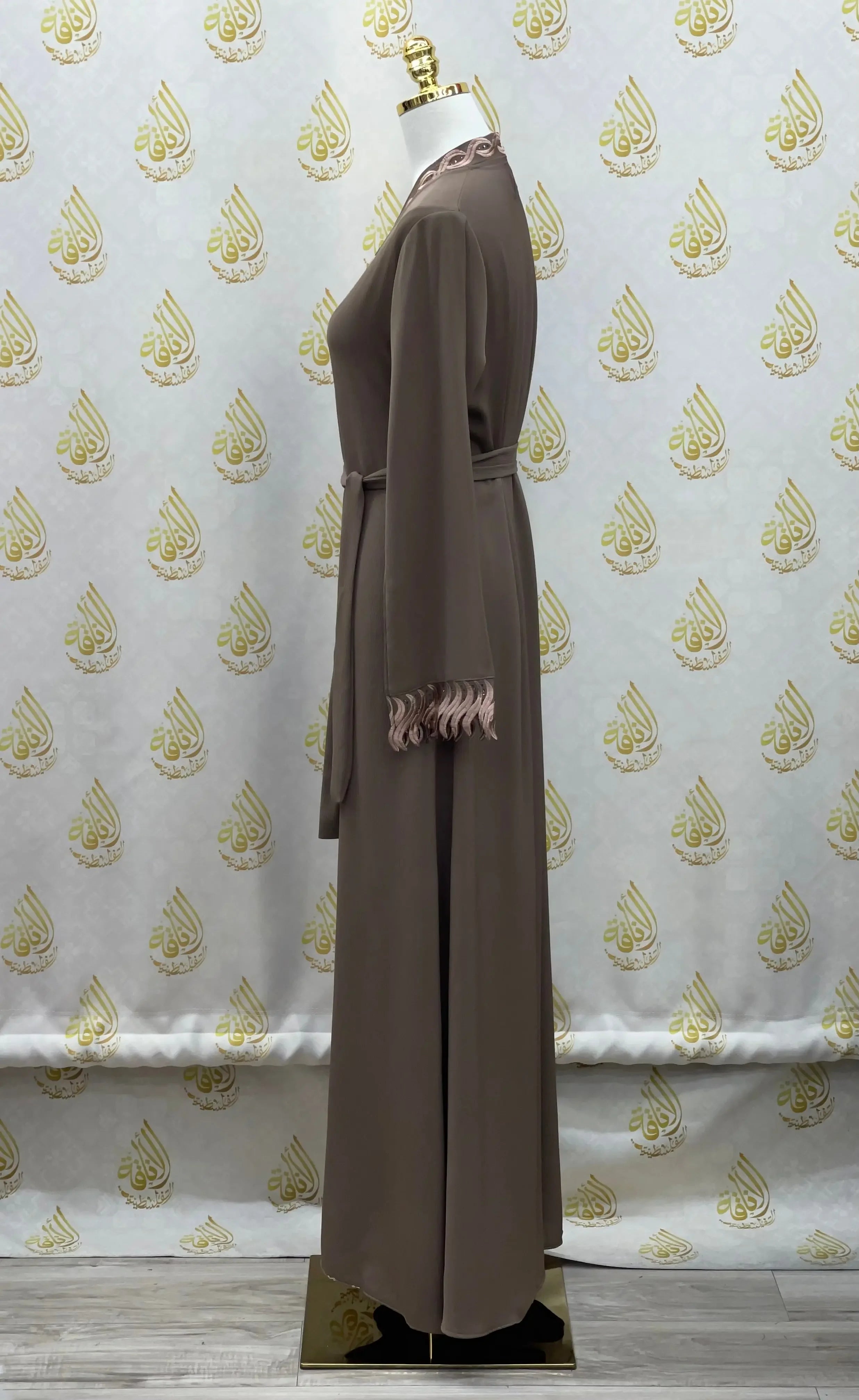 Palestinian Elegance elegant embroidered abaya in brown with detailed sleeve embroidery and waist tie