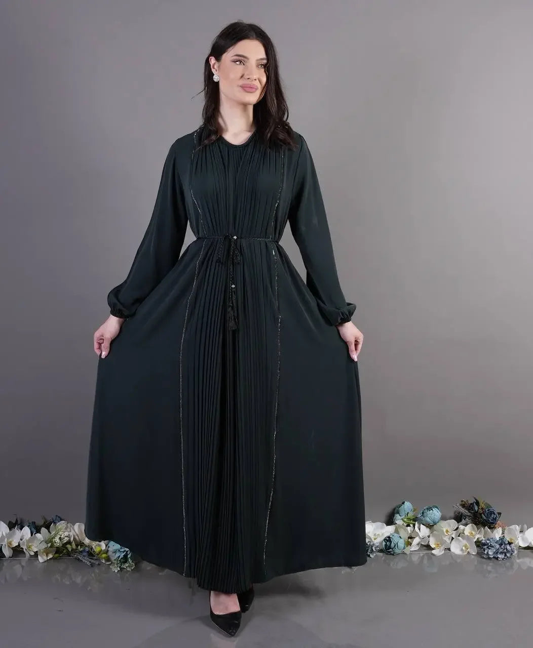 Palestinian Elegance black pleated abaya dress with long sleeves and front button details