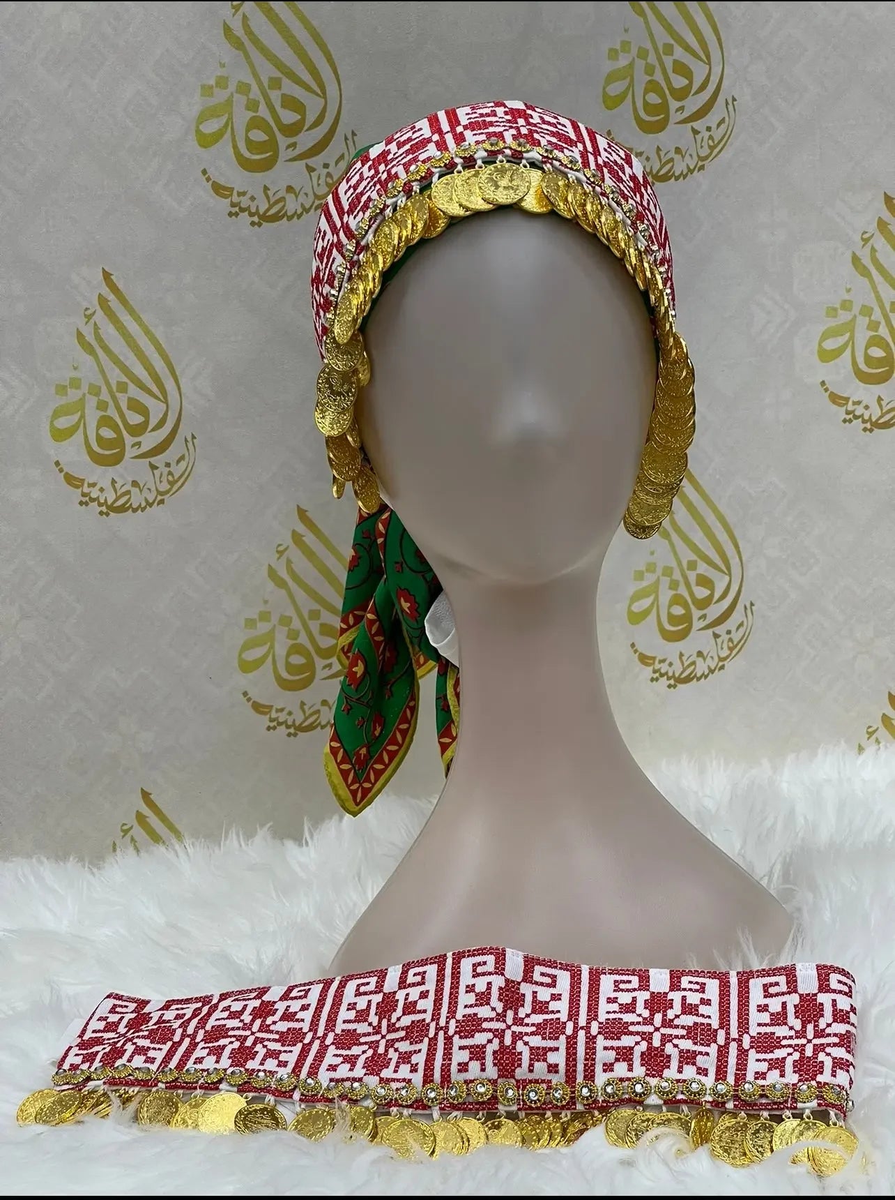 Palestinian Elegance tatreez head scarf with beads and gold coin accents displayed on mannequin