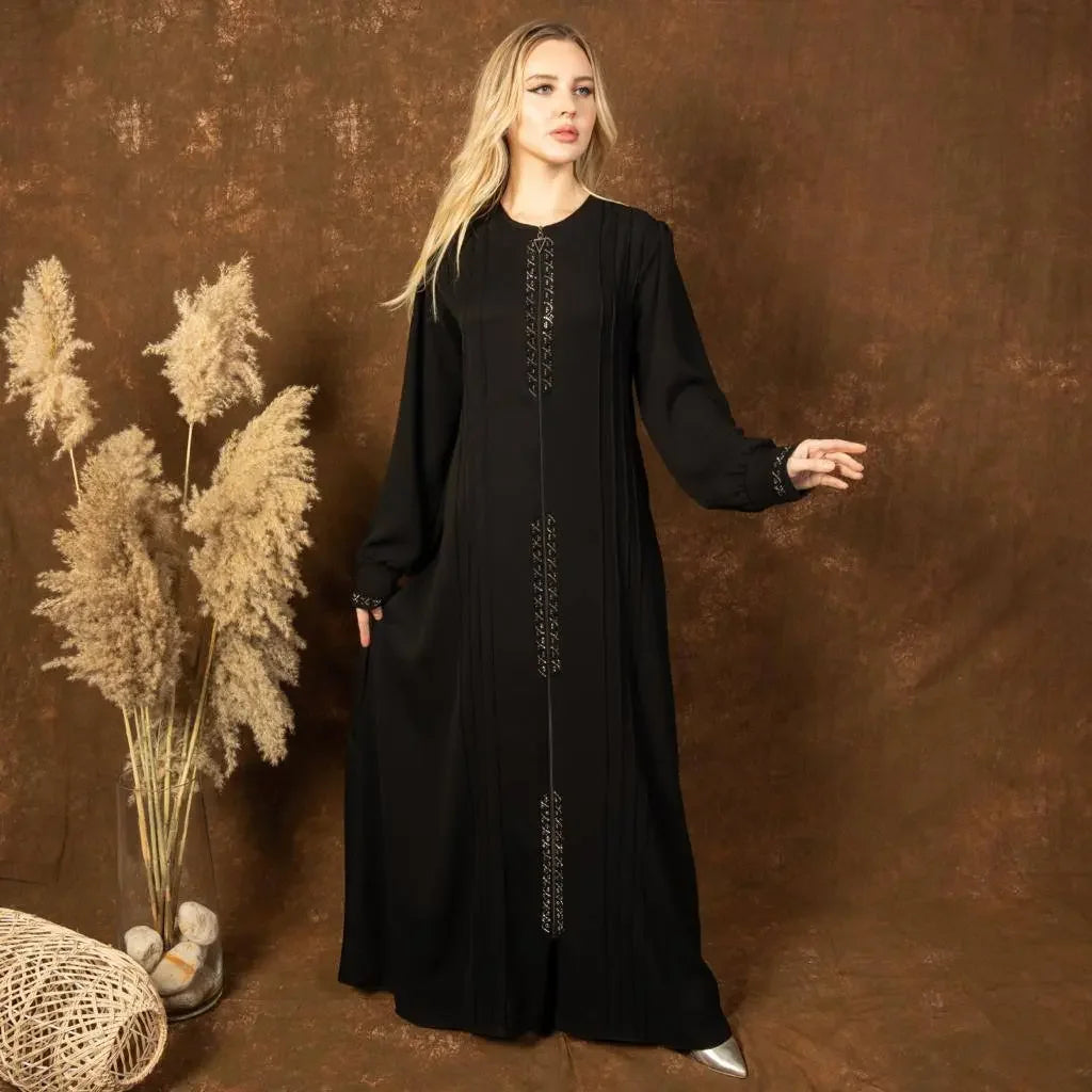 Palestinian Elegance modest abaya for women in black with detailed embroidery and long sleeves