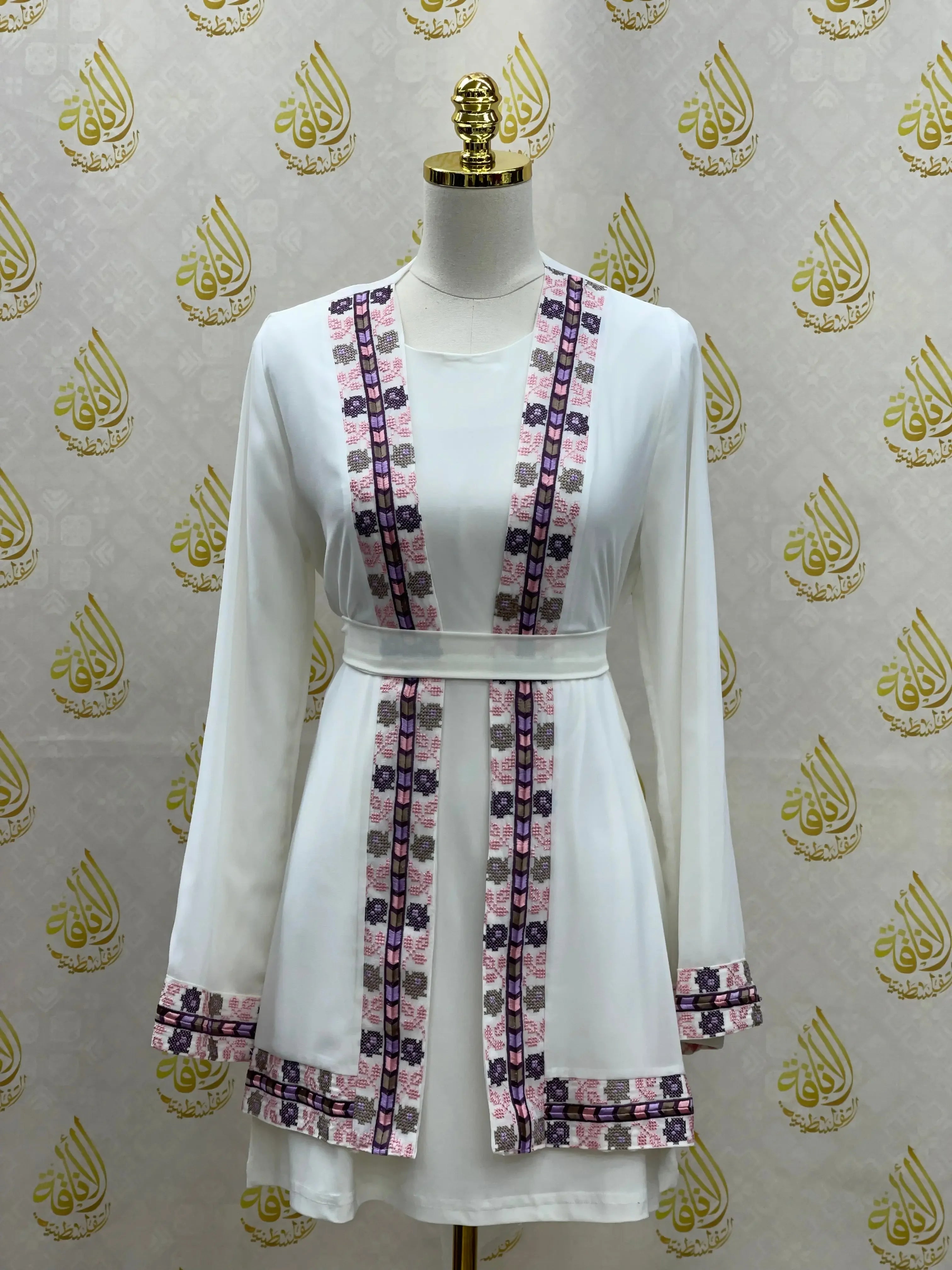 White embroidered chiffon kimono cardigan with pink and purple floral details by Palestinian Elegance