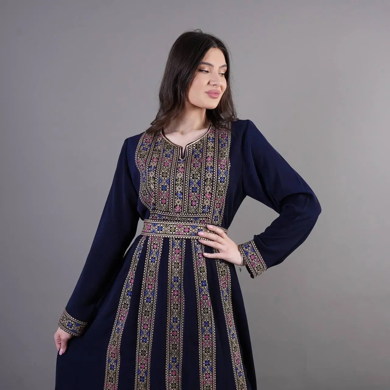 Palestinian Elegance embroidered abaya dress in navy blue with intricate multicolor embroidery on front and cuffs