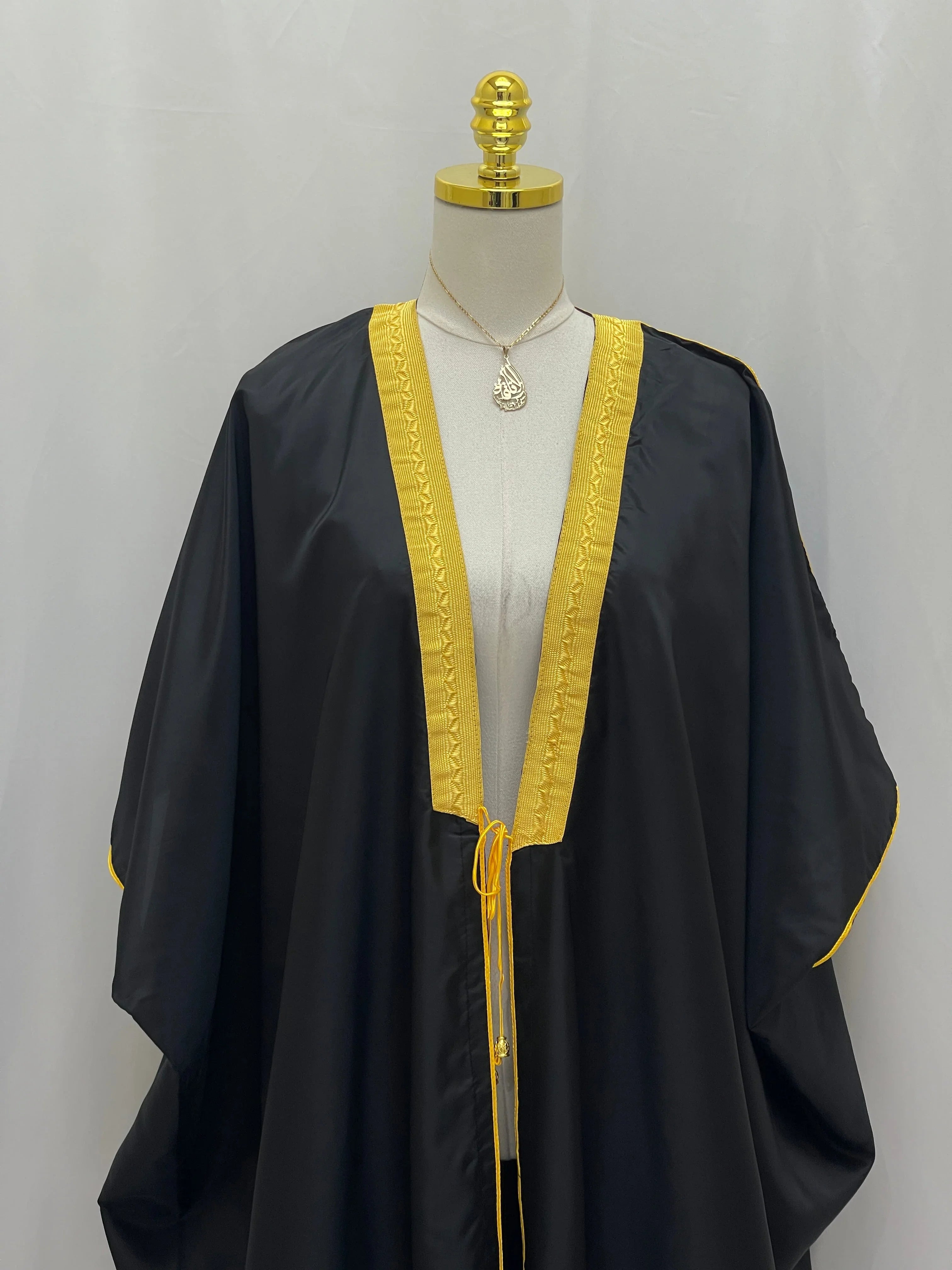 Mens Black Bisht with Golden Trim featuring intricate designs and elegant cut for formal occasions