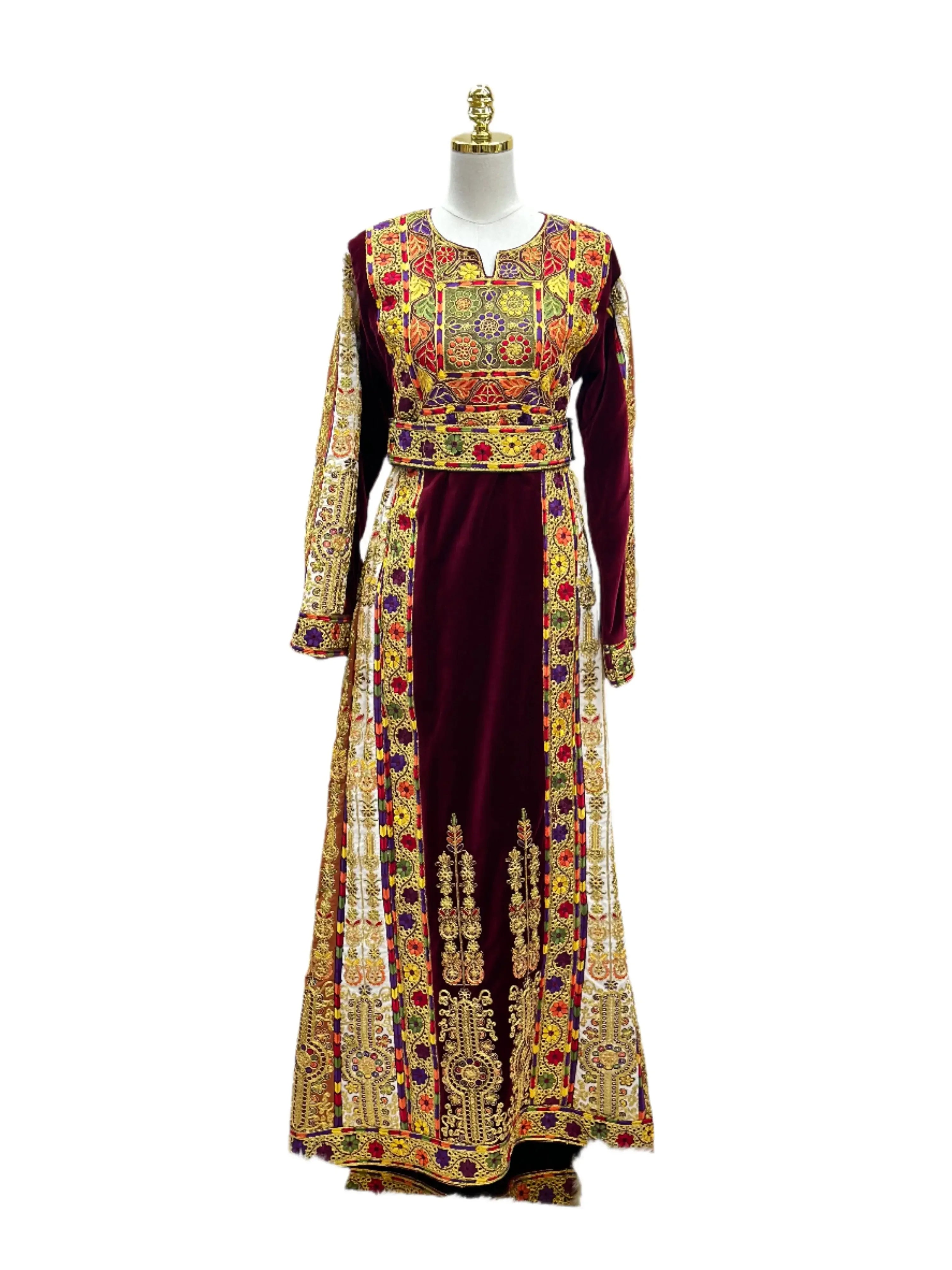 Velvet Palestinian dress with intricate gold embroidery and colorful floral patterns by Palestinian Elegance