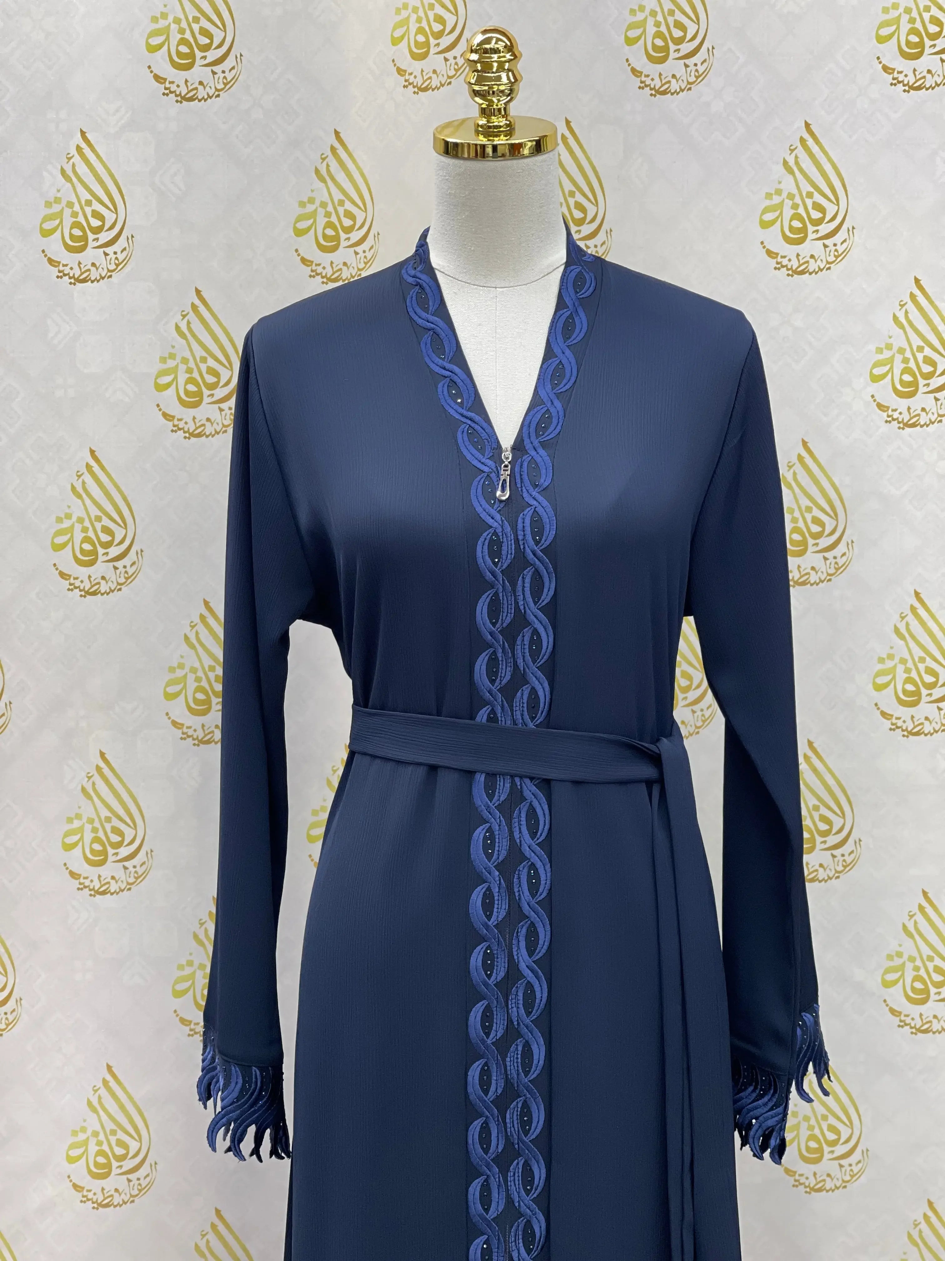 Palestinian Elegance elegant embroidered abaya in navy blue with detailed embroidery and waist tie