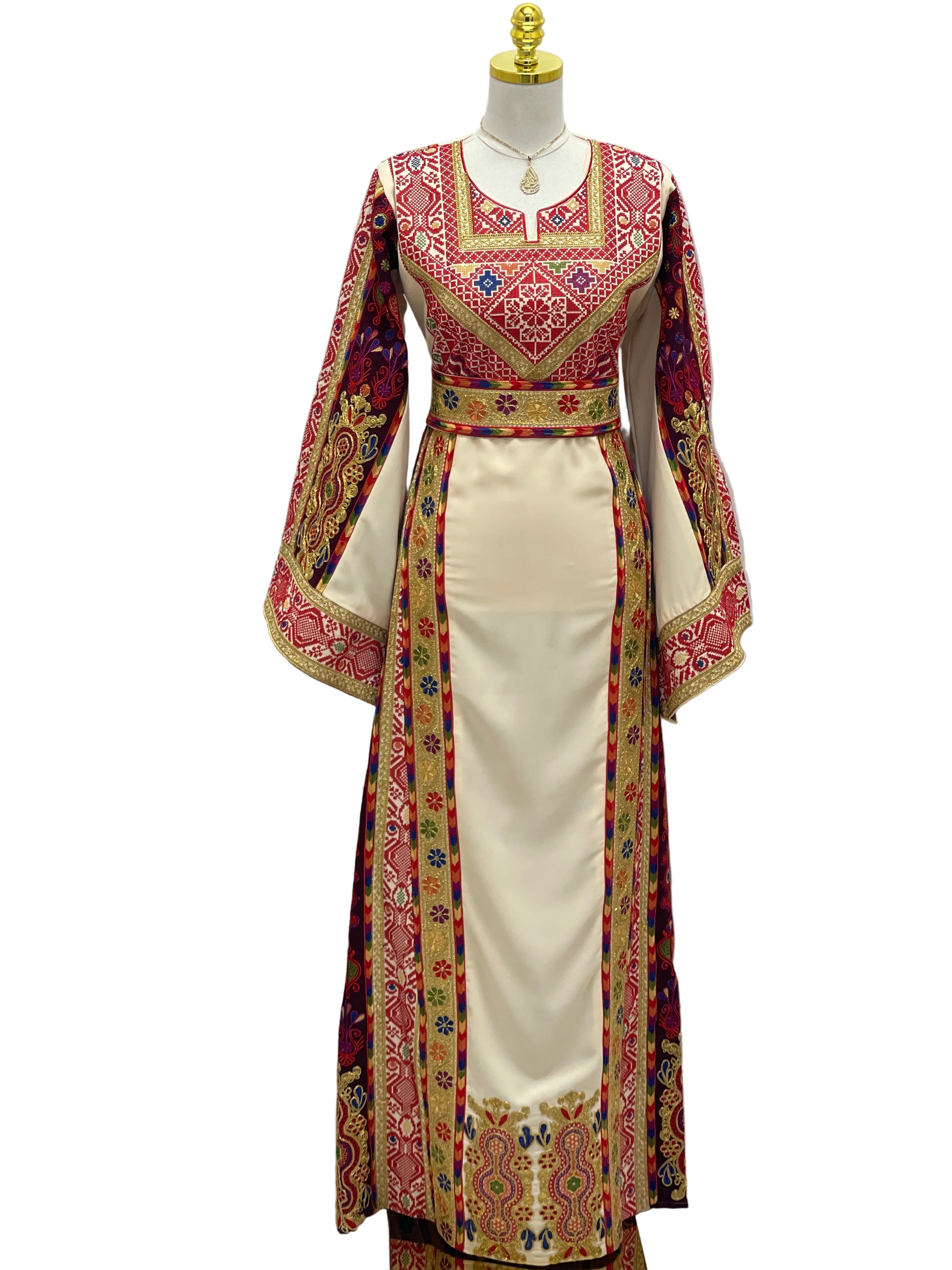 Al Kananiyyah Embroidered Thobe featuring vibrant patterns and elegant long sleeves, perfect for special occasions