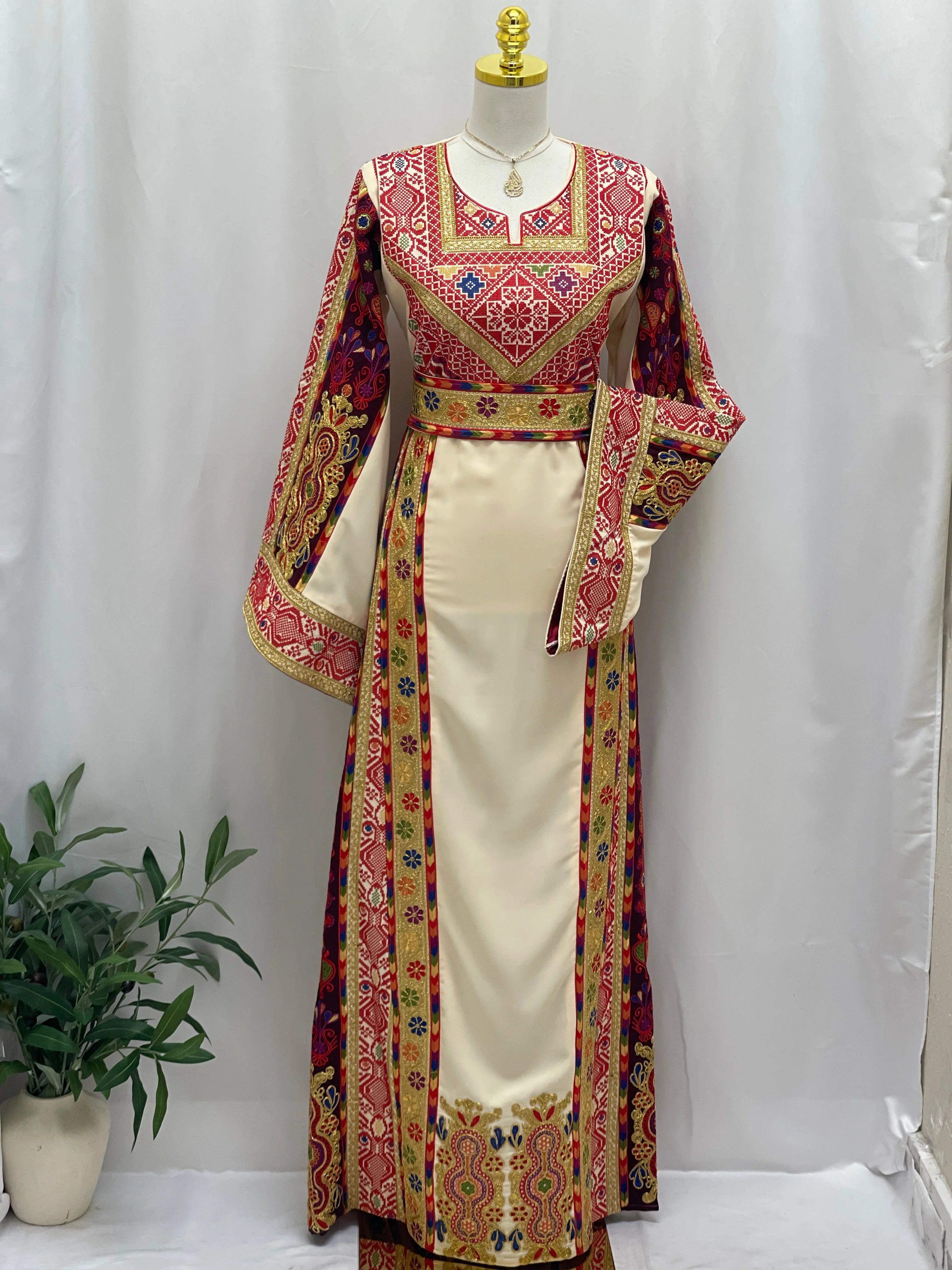 Al Kananiyyah Embroidered Thobe featuring intricate patterns and vibrant colors perfect for special occasions