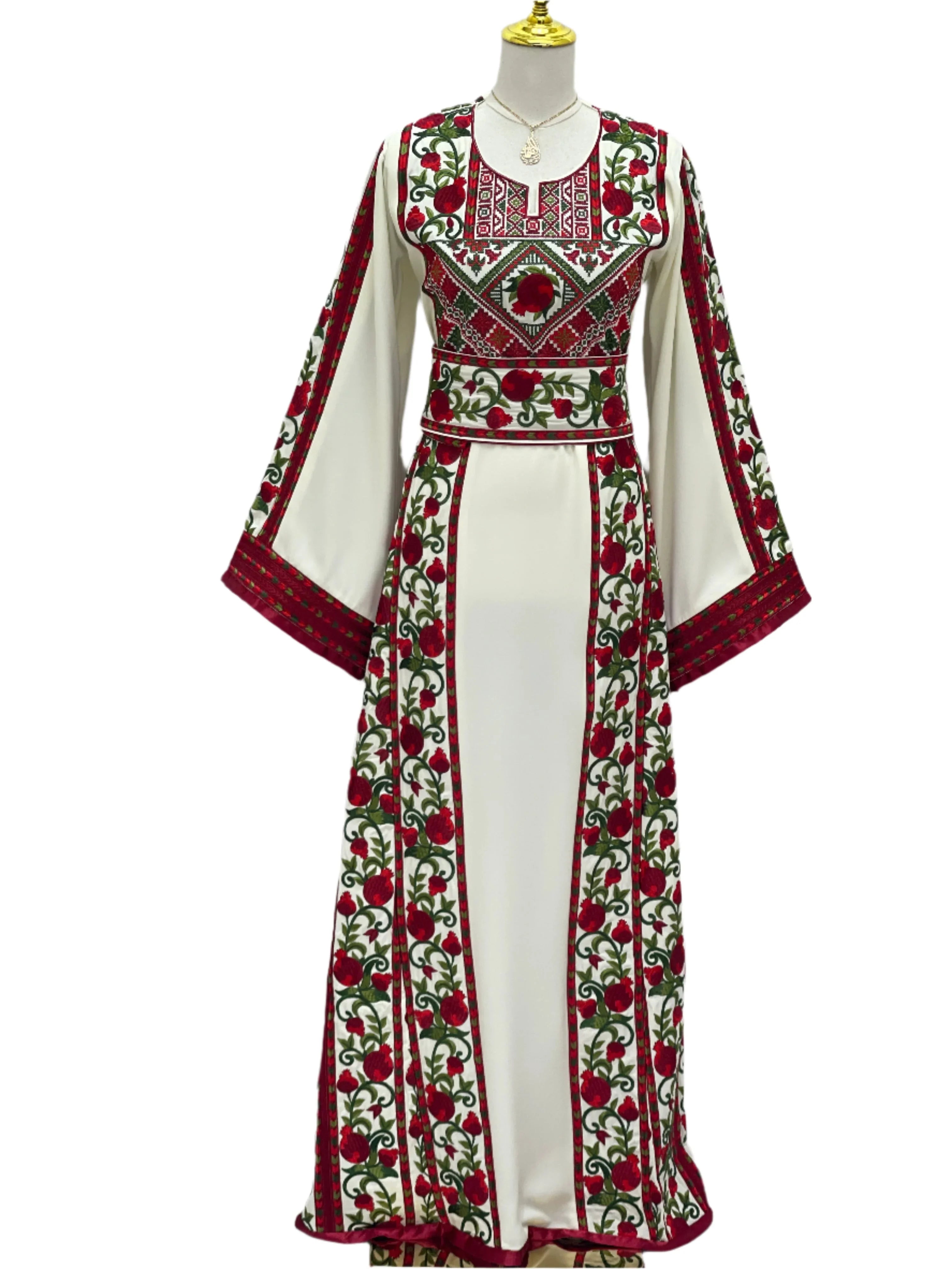 Al Romana Pomegranate Embroidered Thoub by Palestinian Elegance with detailed red and green floral embroidery