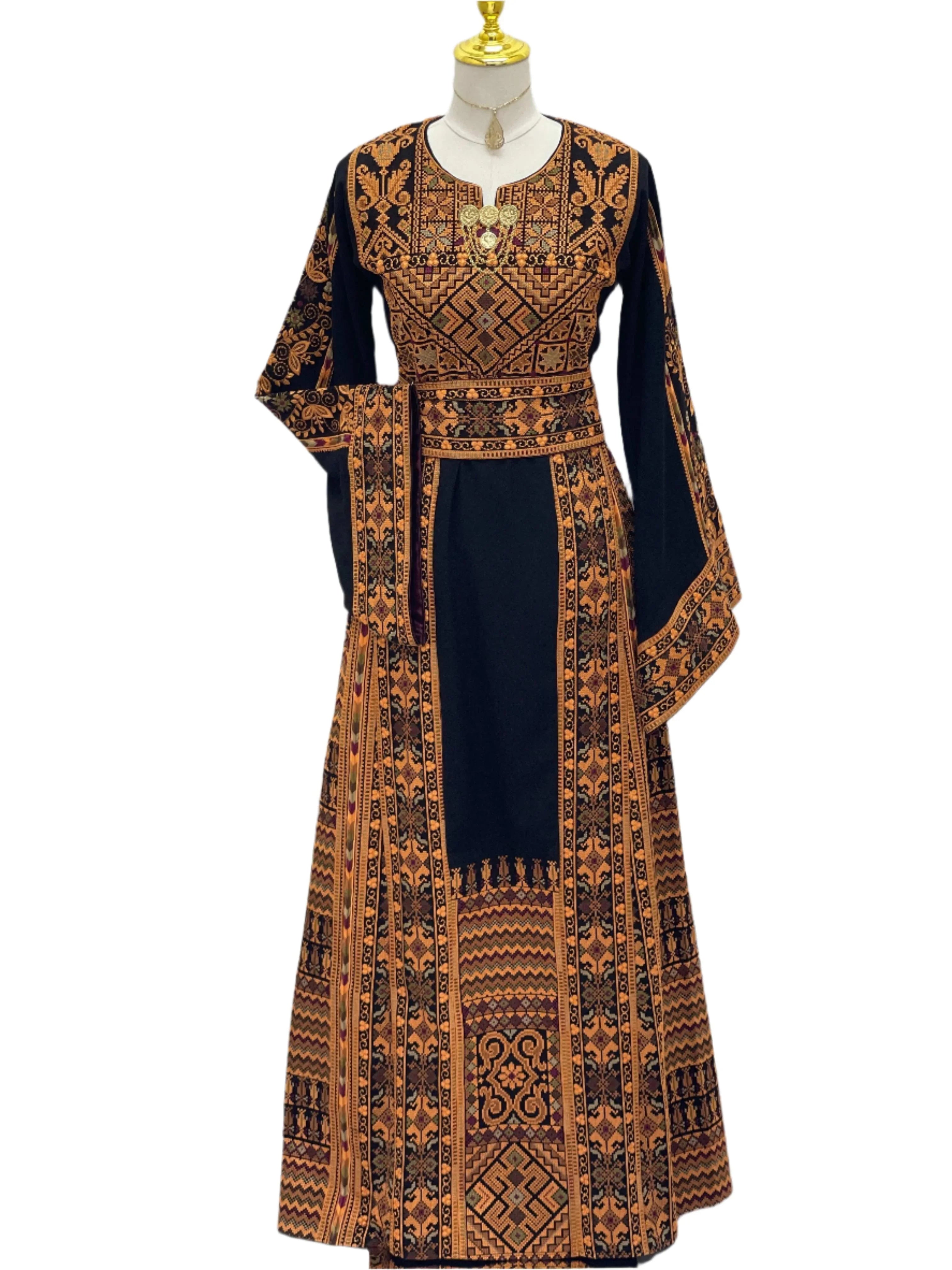 Embroidered Thoub Palestinian Modest Tatreez dress by Palestinian Elegance in black and brown with traditional patterns