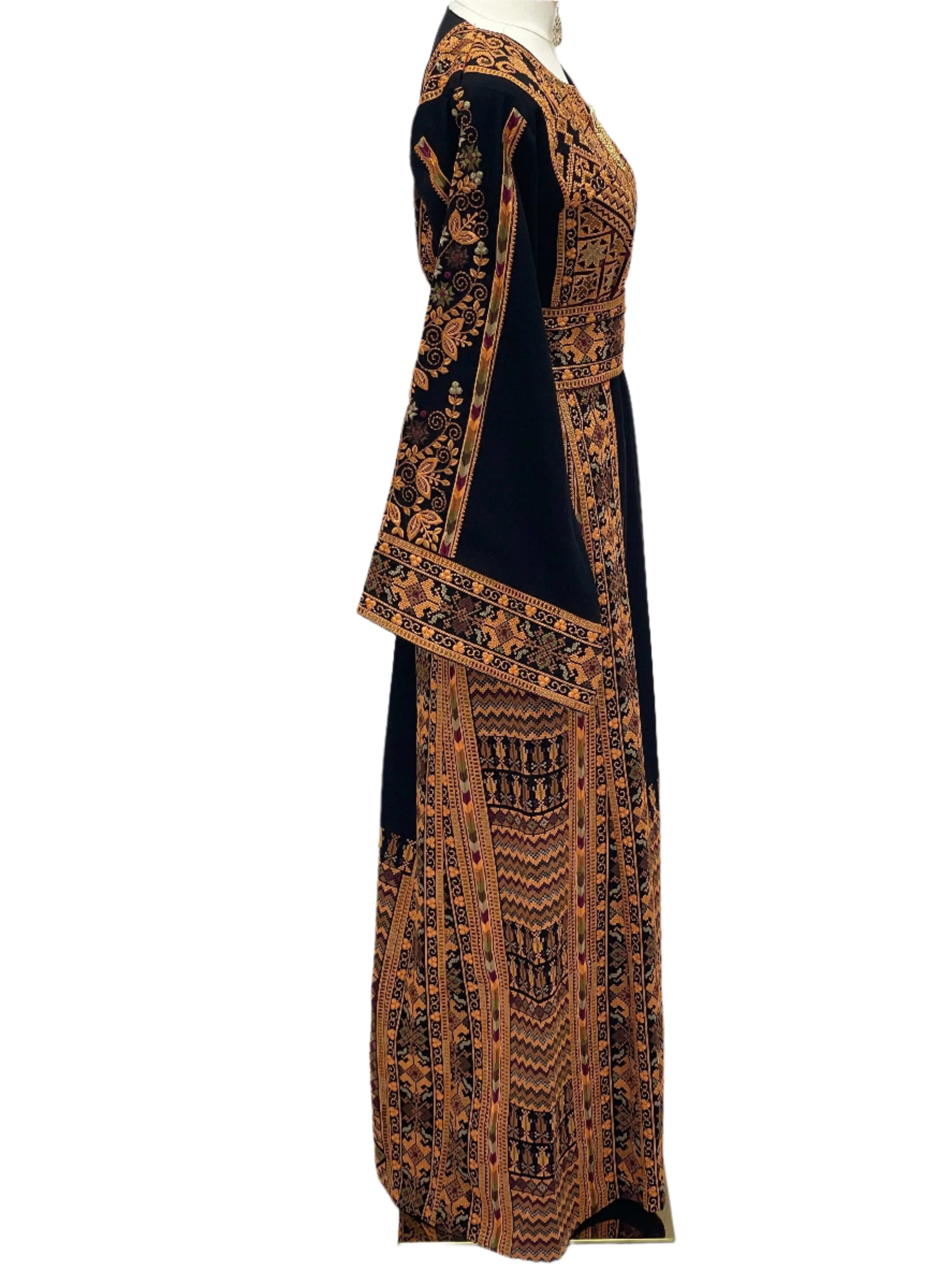 Embroidered Thoub Palestinian Modest Tatreez black dress with intricate orange embroidery by Palestinian Elegance
